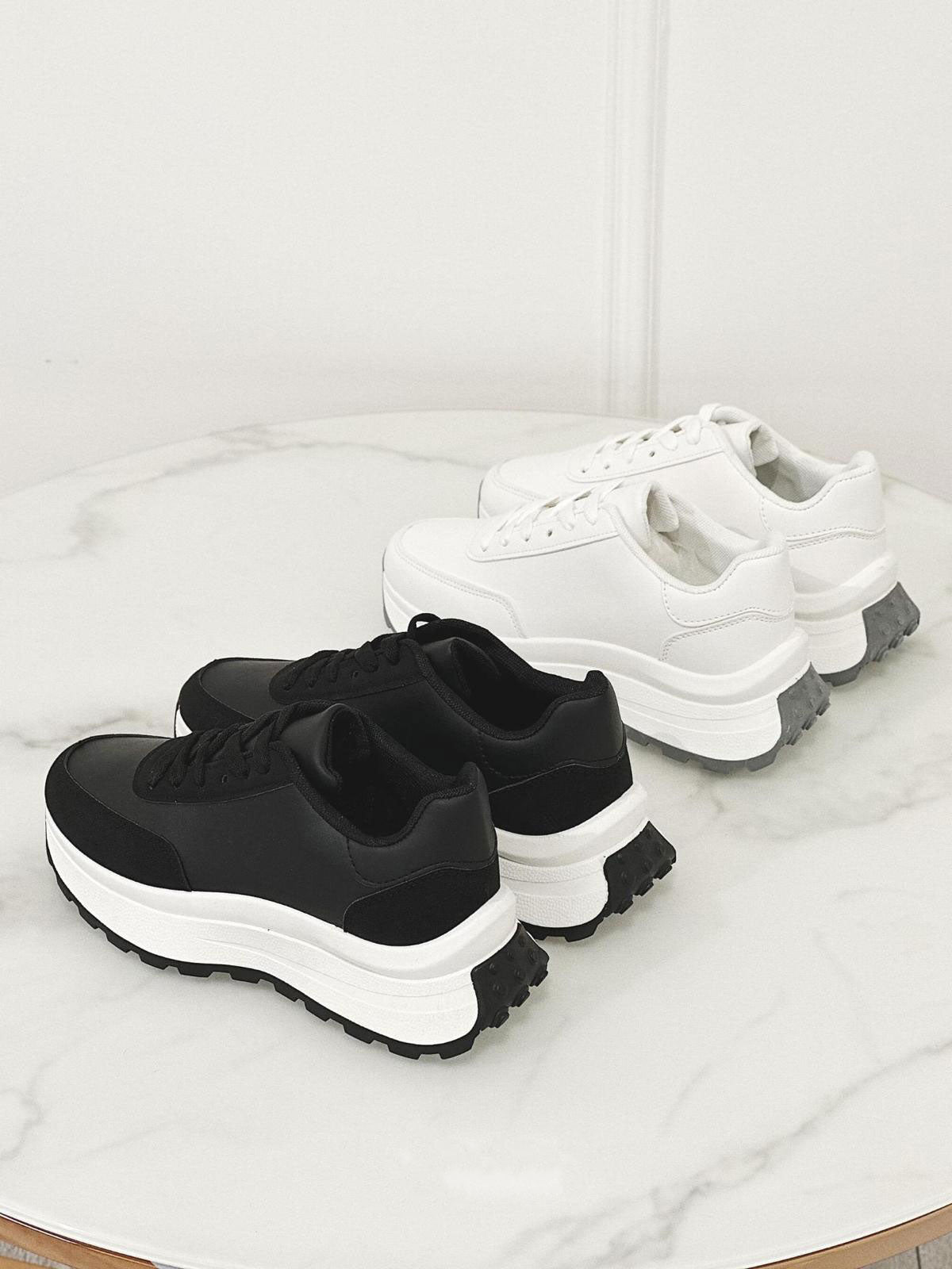 Eileen - Enfärgade sneakers med skosnöre