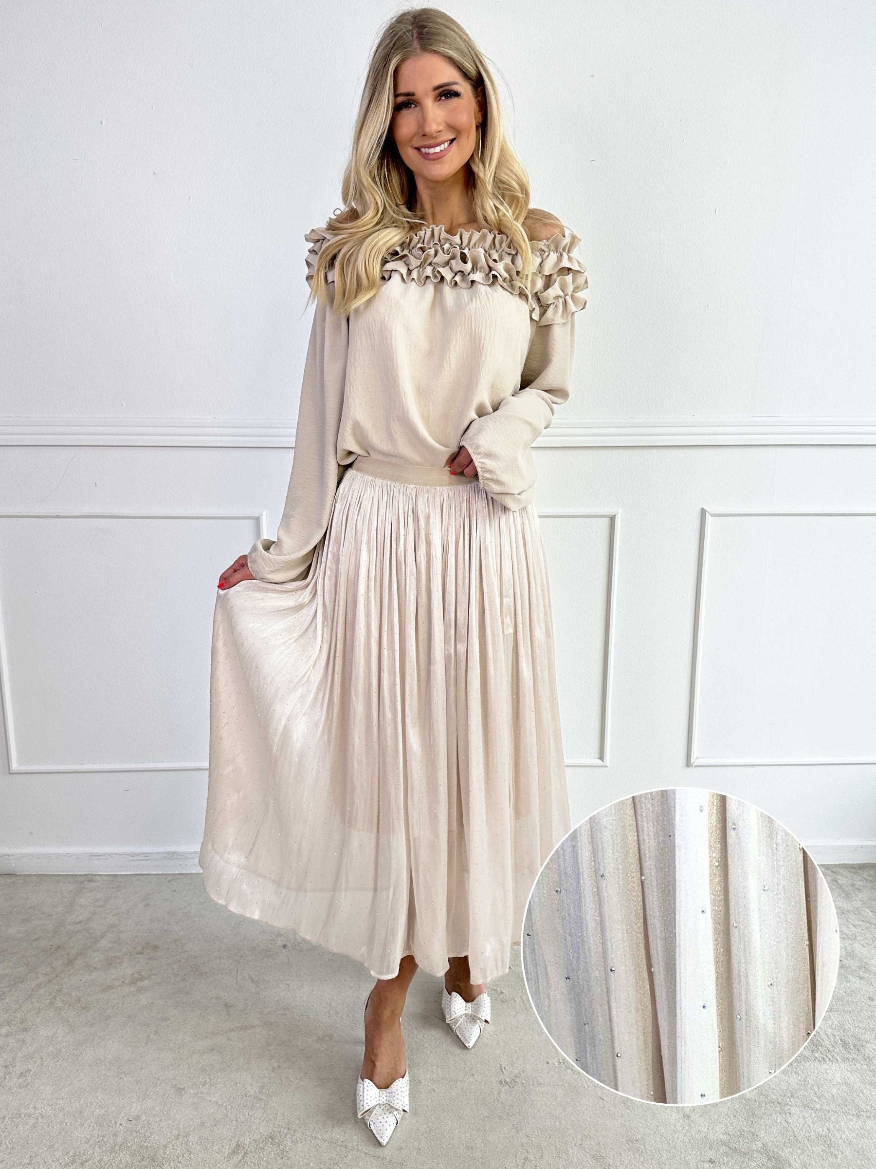 Afrodite - Feminin kjol i glansigt tyg med strass