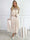 Afrodite - Feminin kjol i glansigt tyg med strass