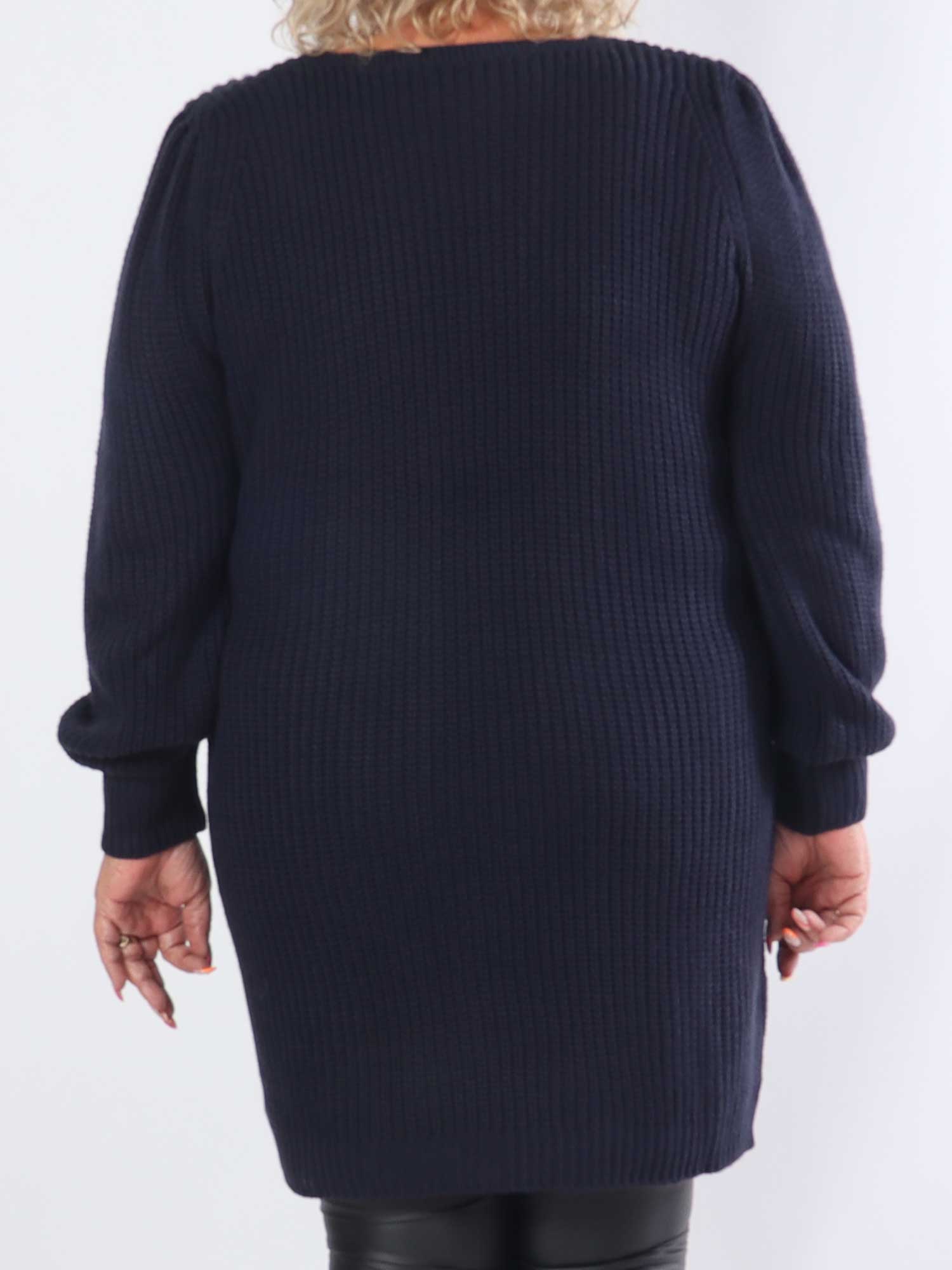 Dajana - Stickad klänning i plus size med ballongärmar