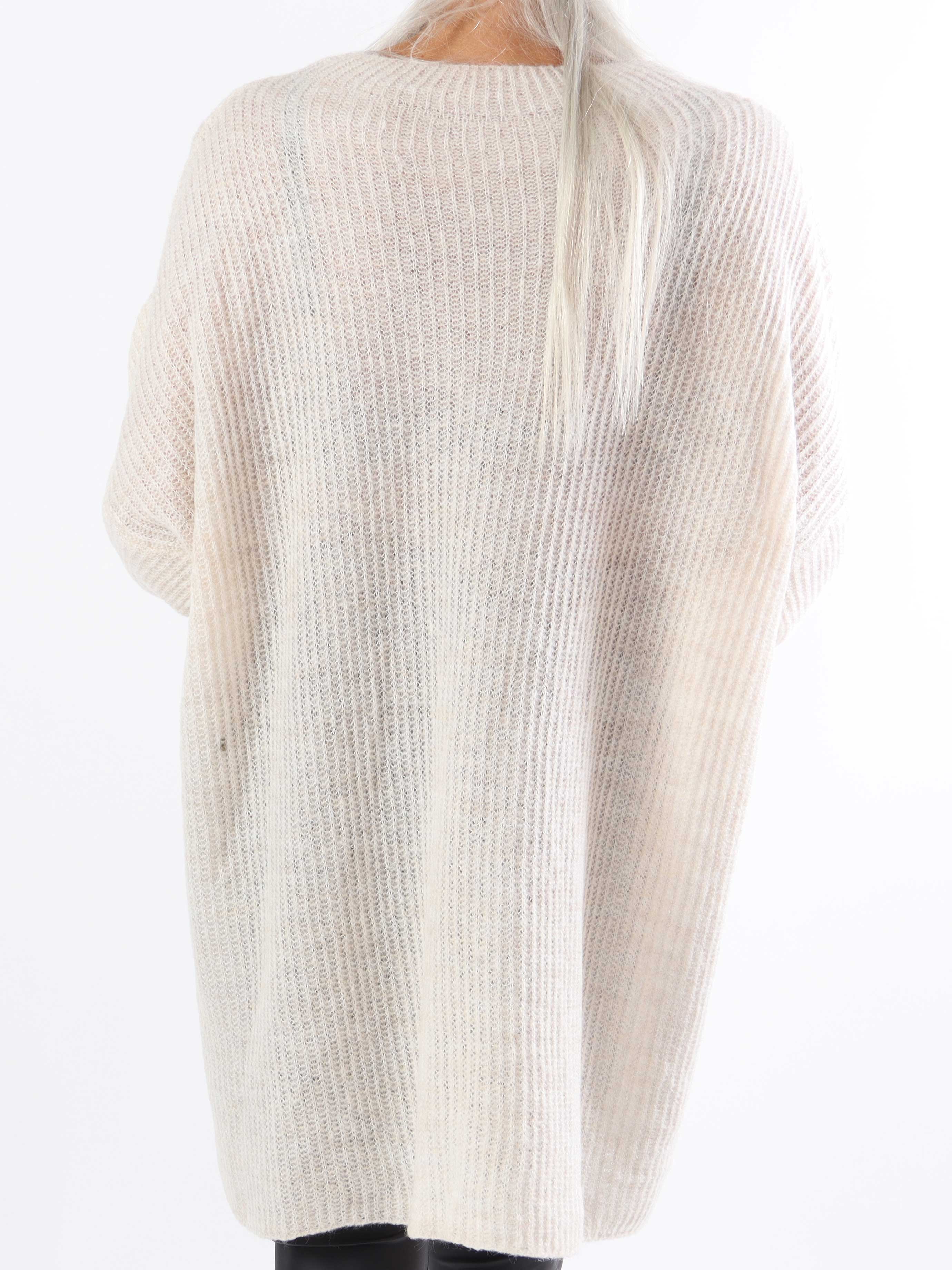 Dakota - Lång stickad blus i plus size med fickor