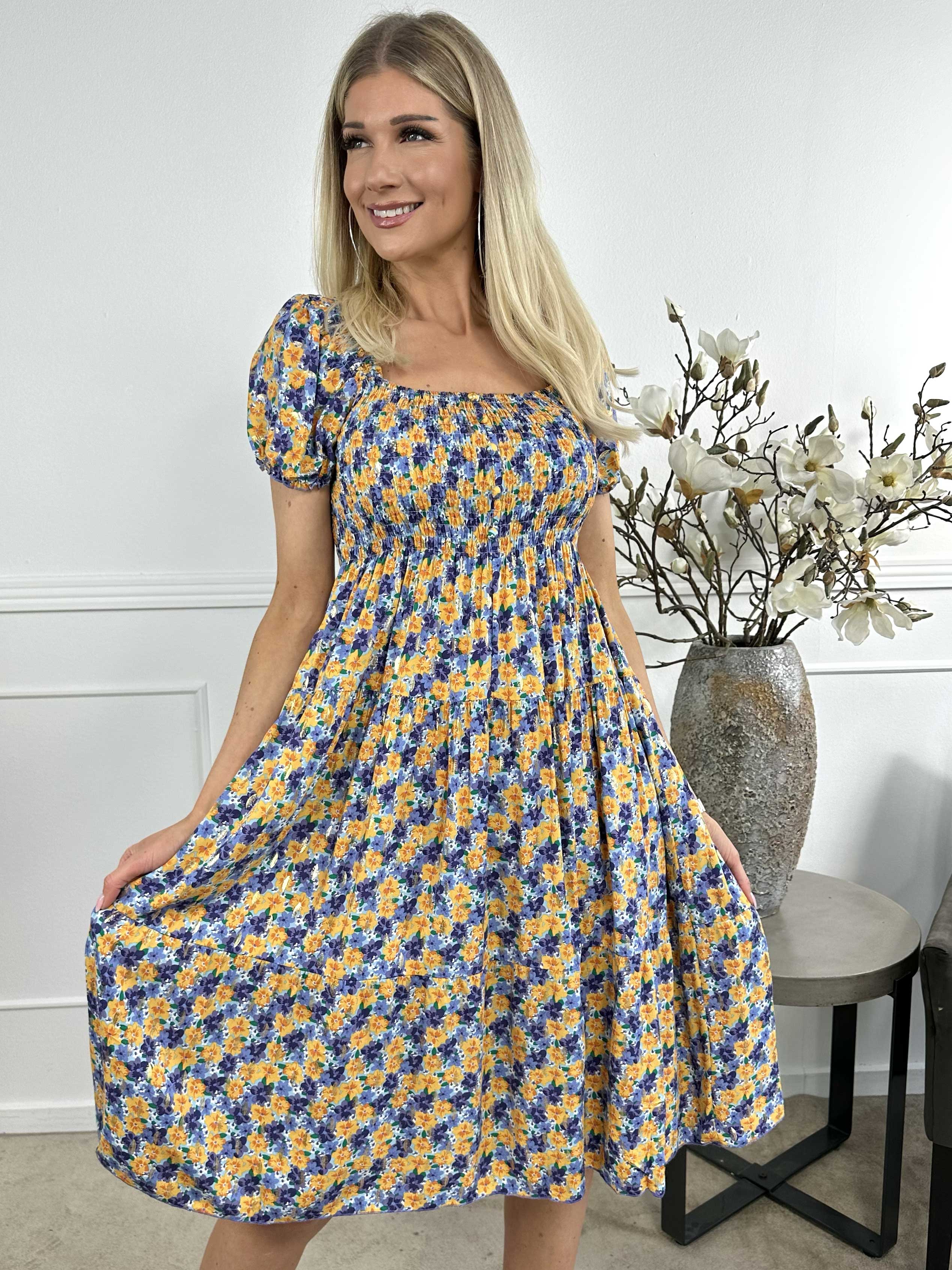Daphne - Söt blommig sommarklänning med smockad byst