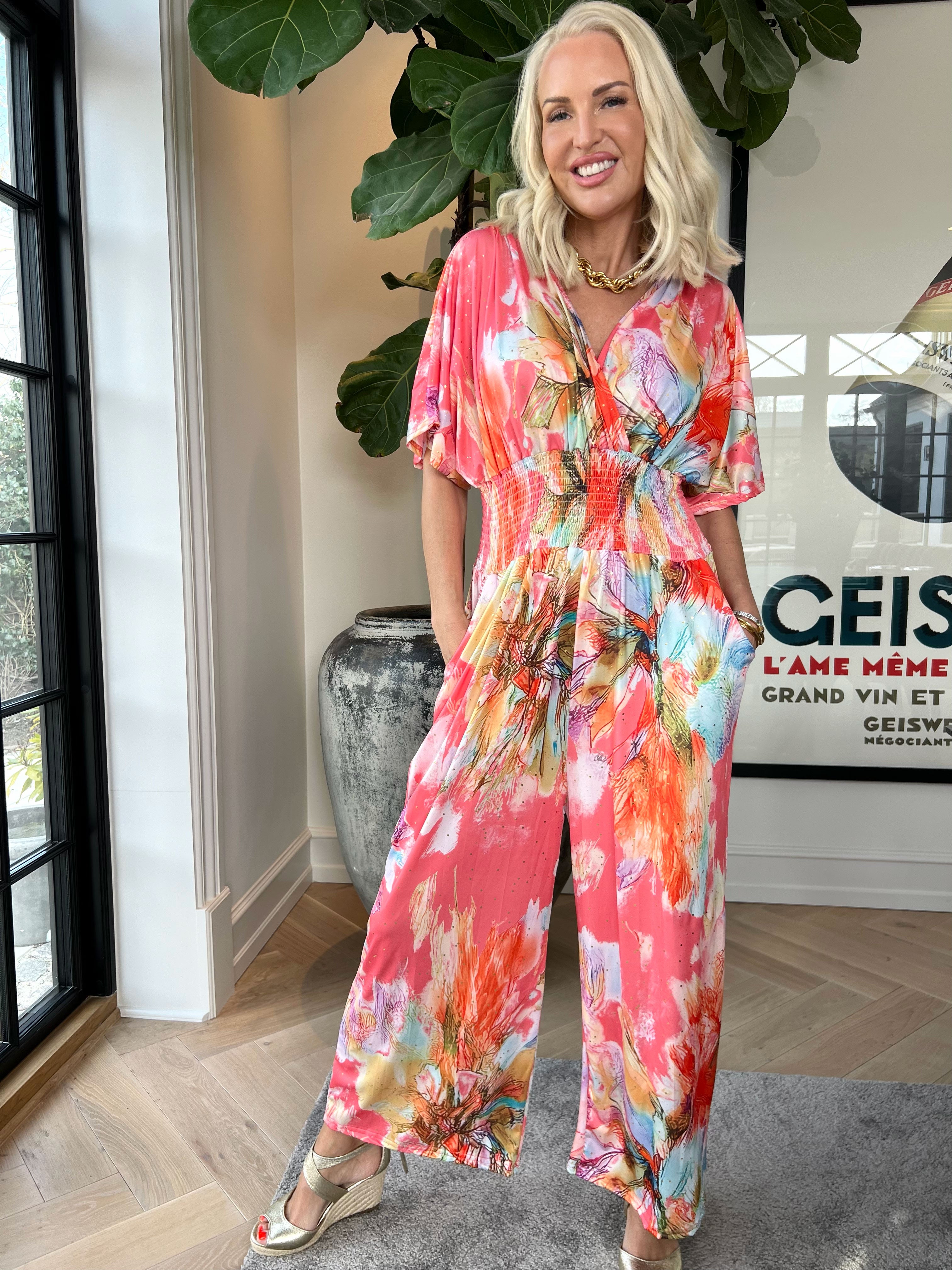 Pams Print Jumpsuit - Stretchig mönstrad jumpsuit med guldfärgat damm