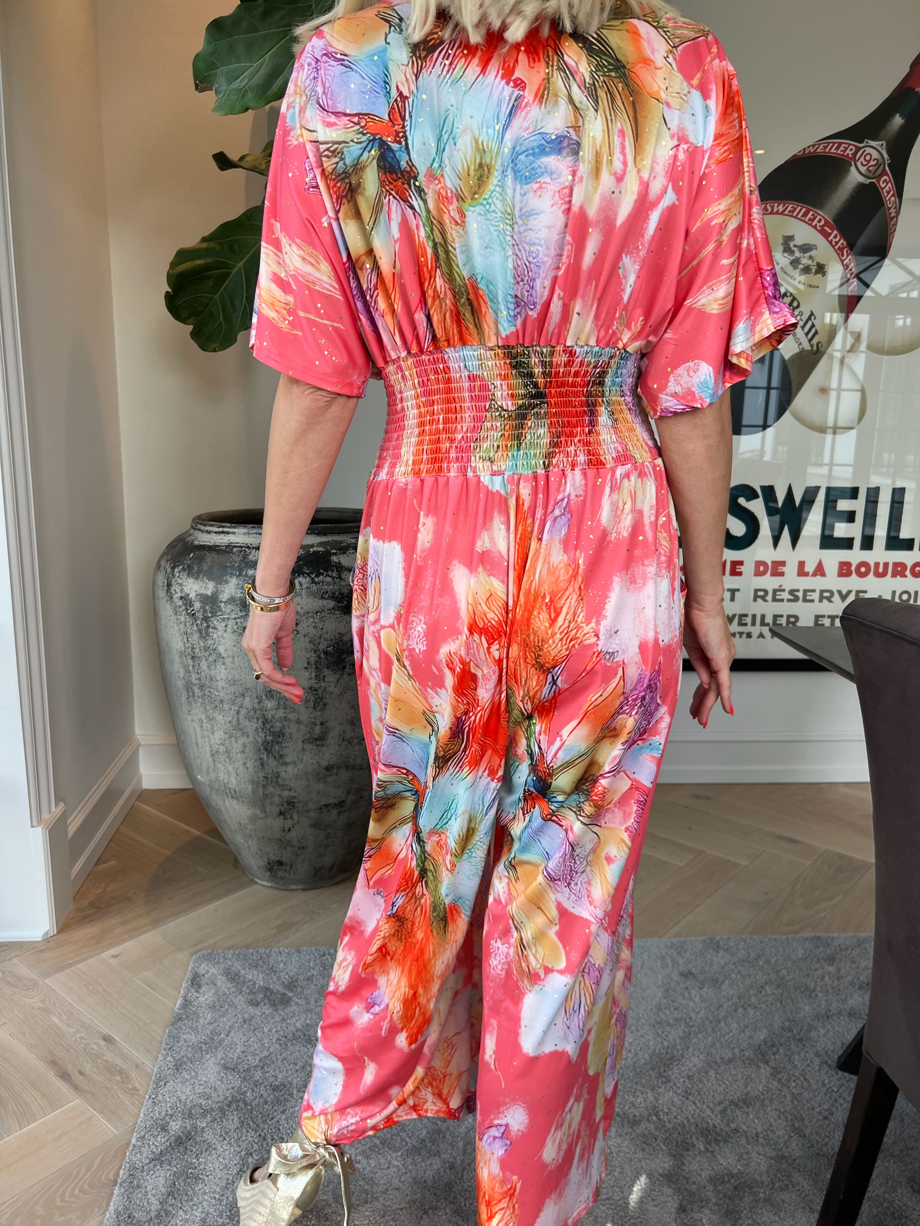 Pams Print Jumpsuit - Stretchig mönstrad jumpsuit med guldfärgat damm
