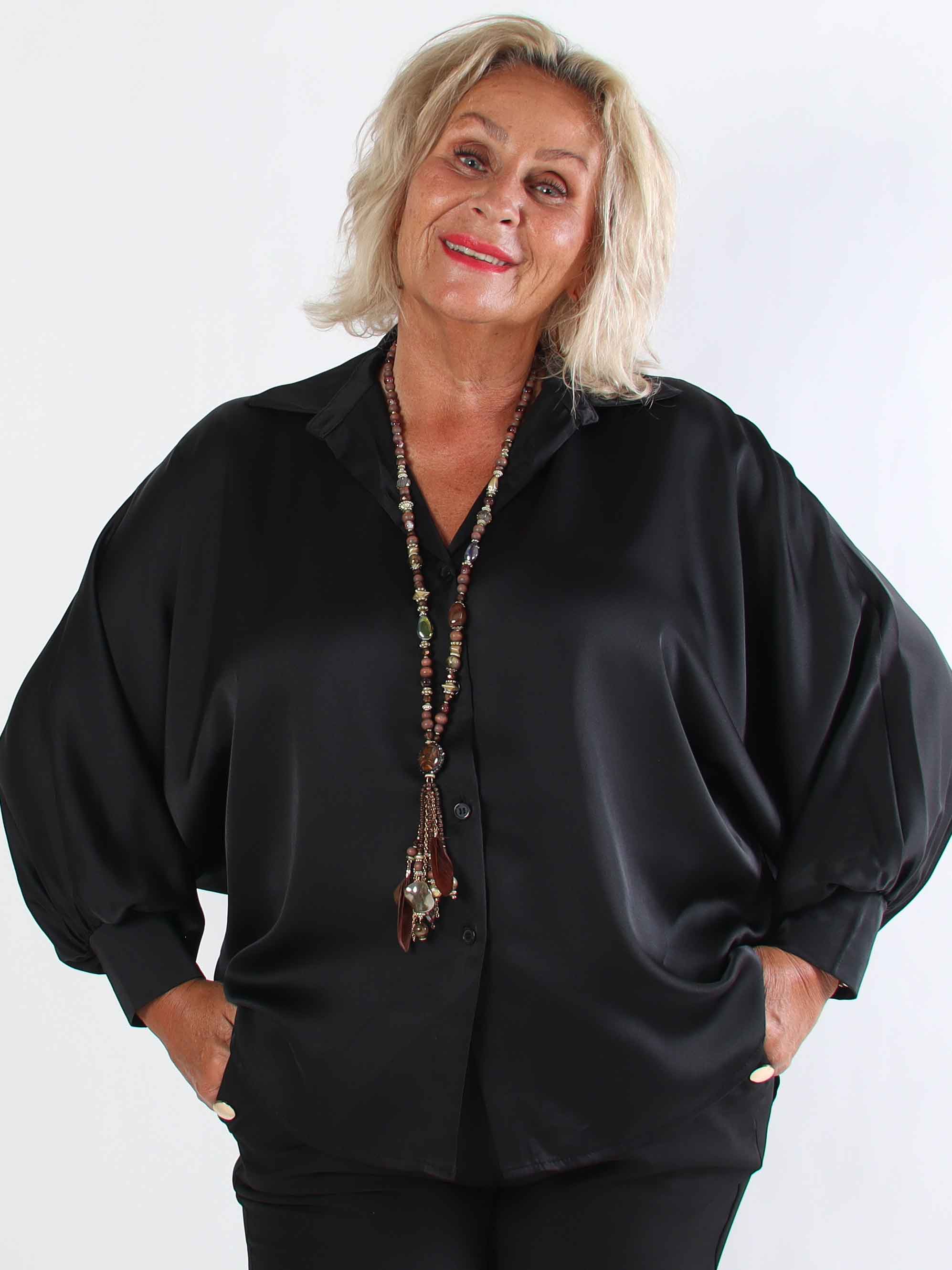 Feliciti - Shiny plus size skjorta med fladdermusärmar