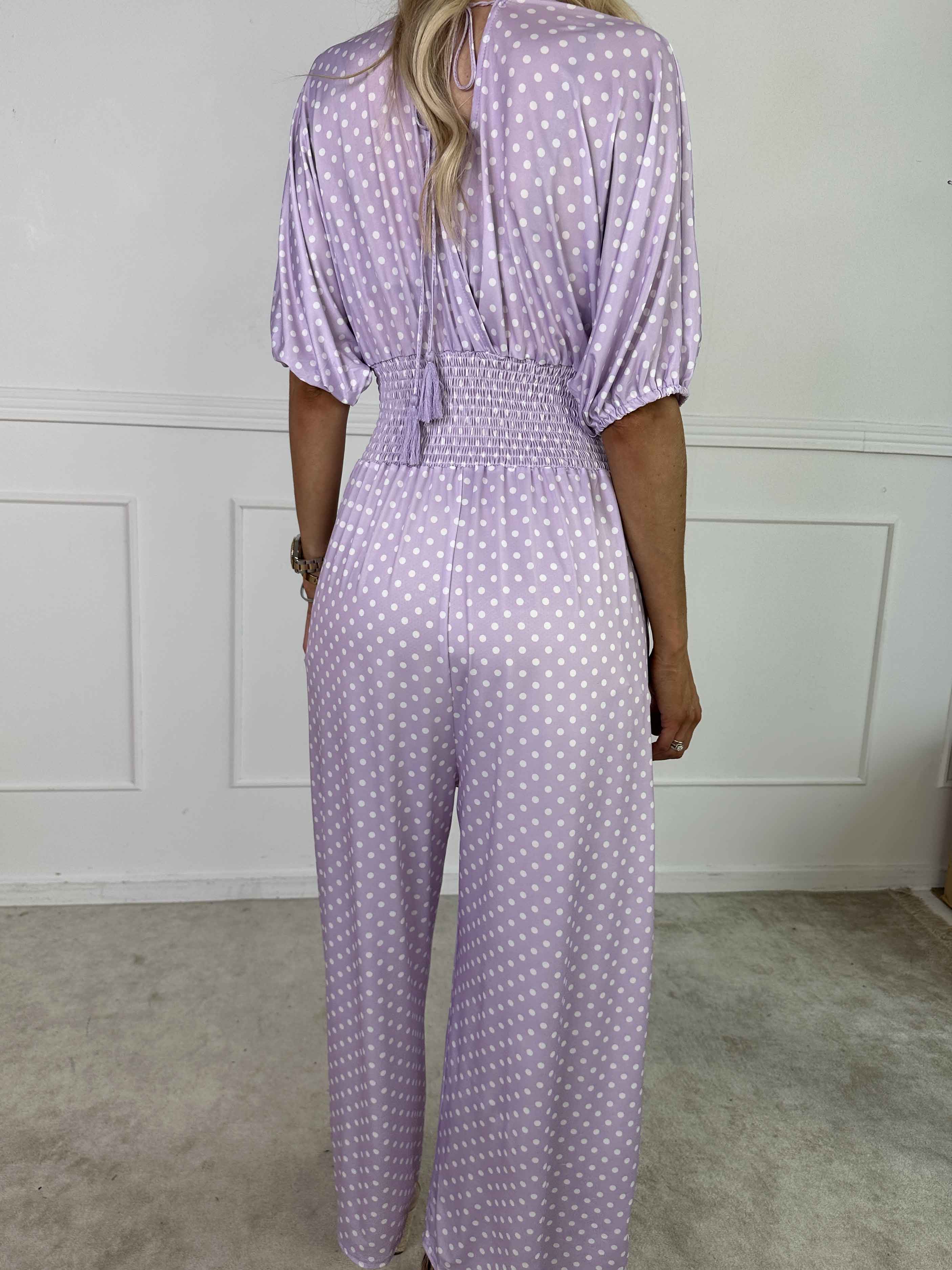 Grace - Stretchig jumpsuit med vita prickar