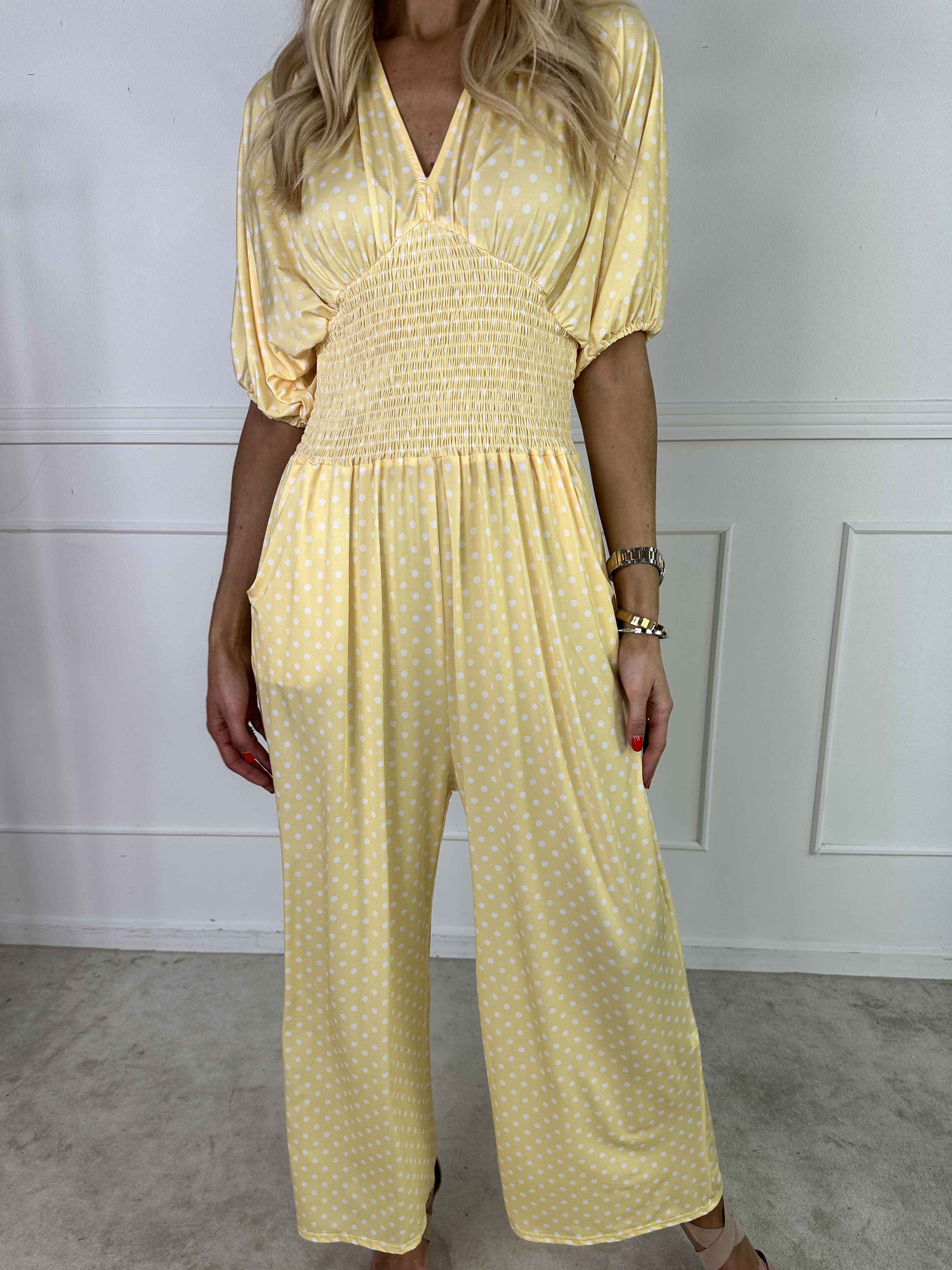 Grace - Stretchig jumpsuit med vita prickar