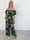 Pams Frill Jumpsuit - Elastisk jumpsuit med smock och volang