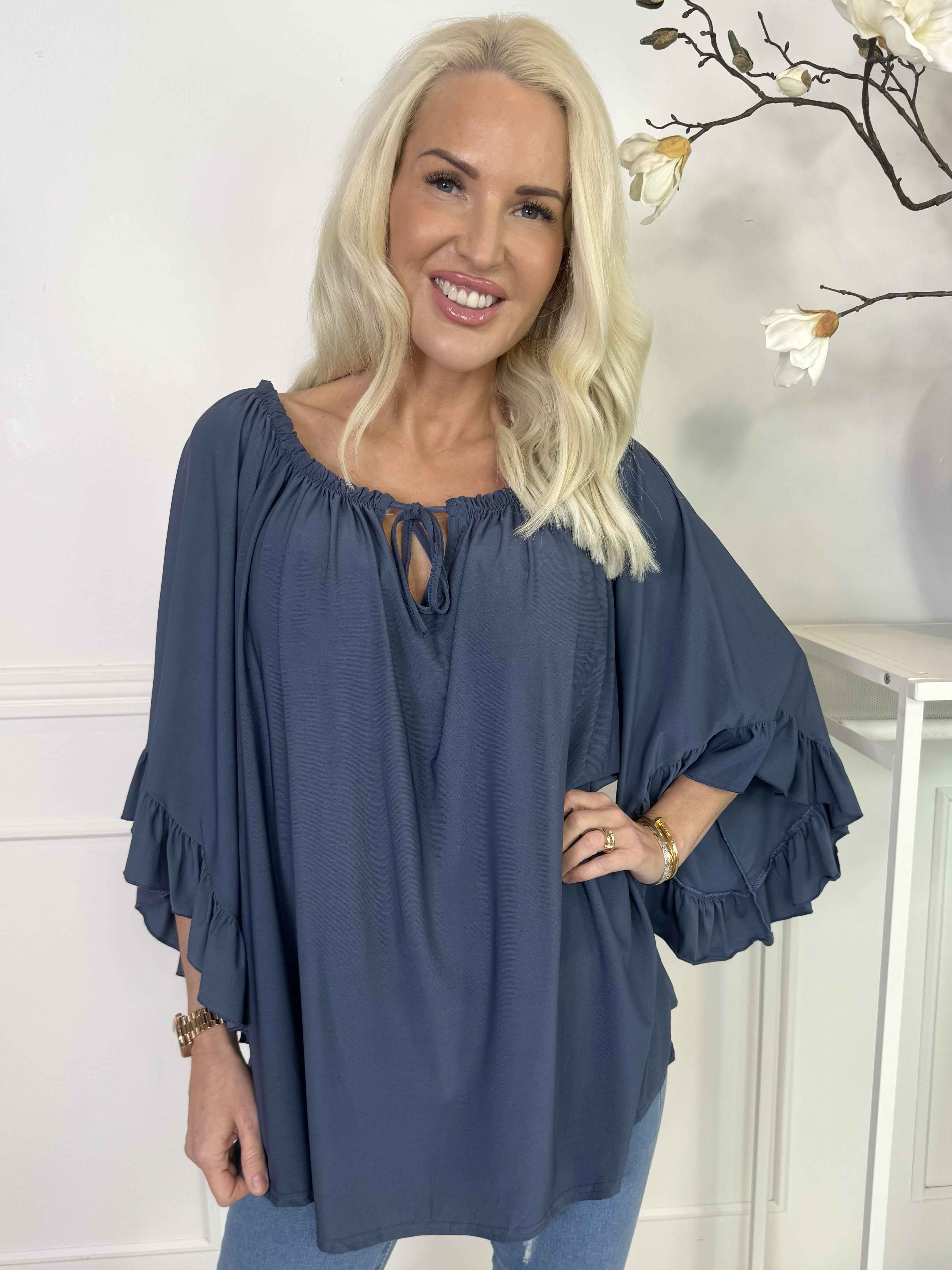 Anneli - Söt elastisk tunika med volangärmar