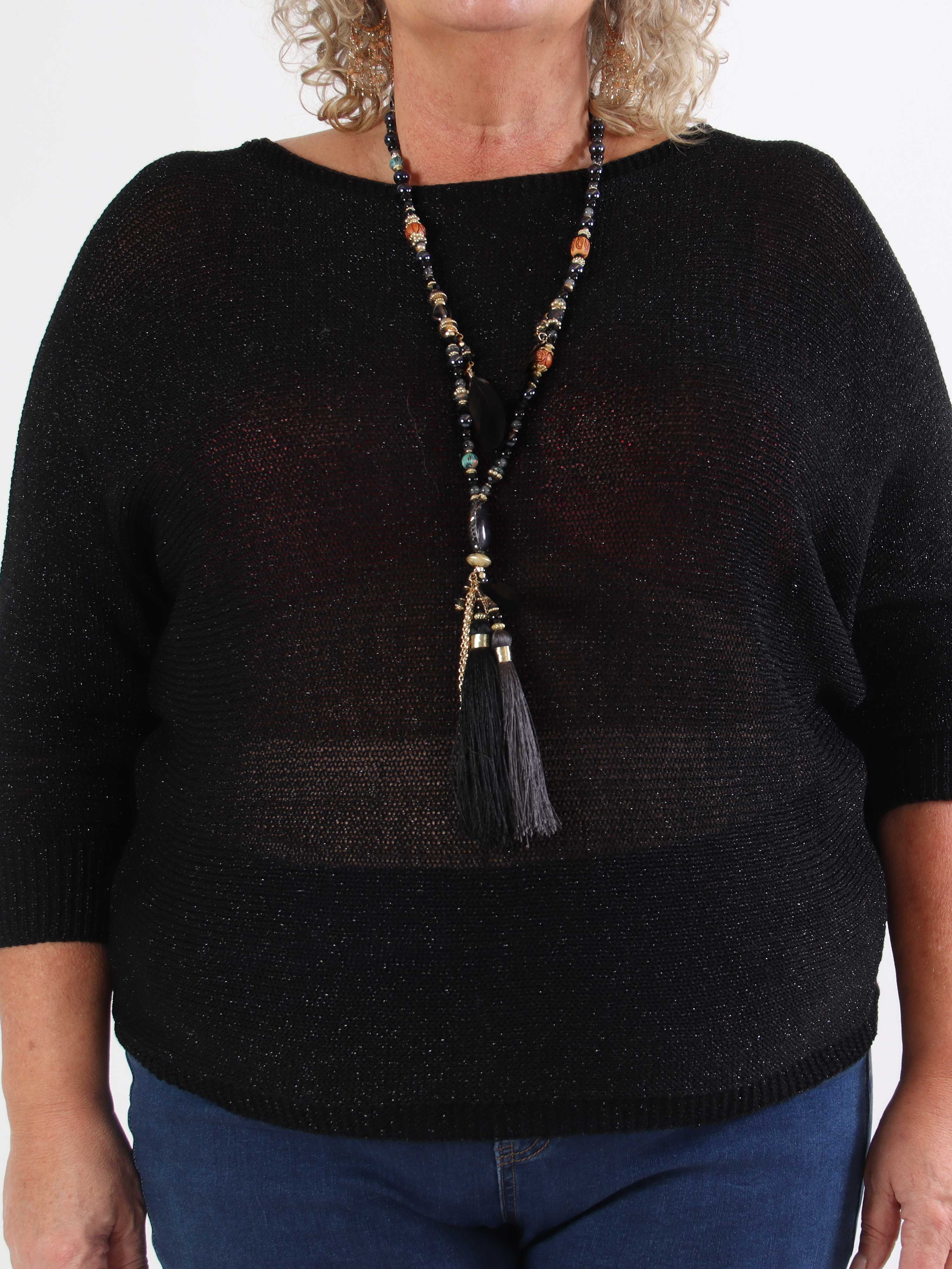 Paulina - Stickad blus i plus size med glittertrådar och rosett