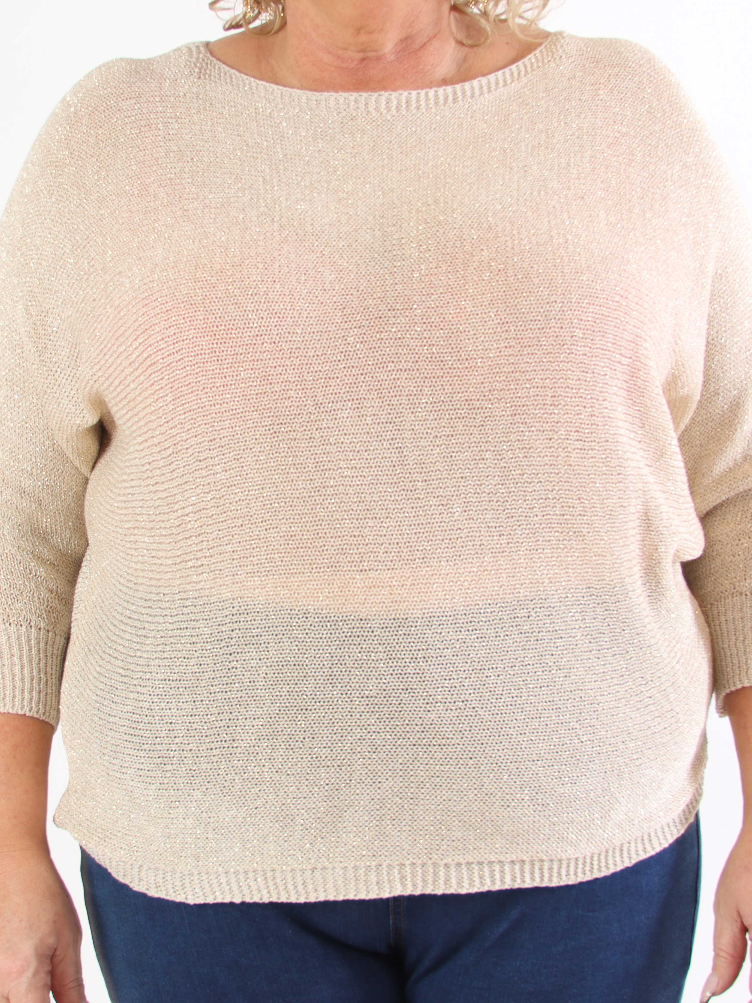 Paulina - Stickad blus i plus size med glittertrådar och rosett