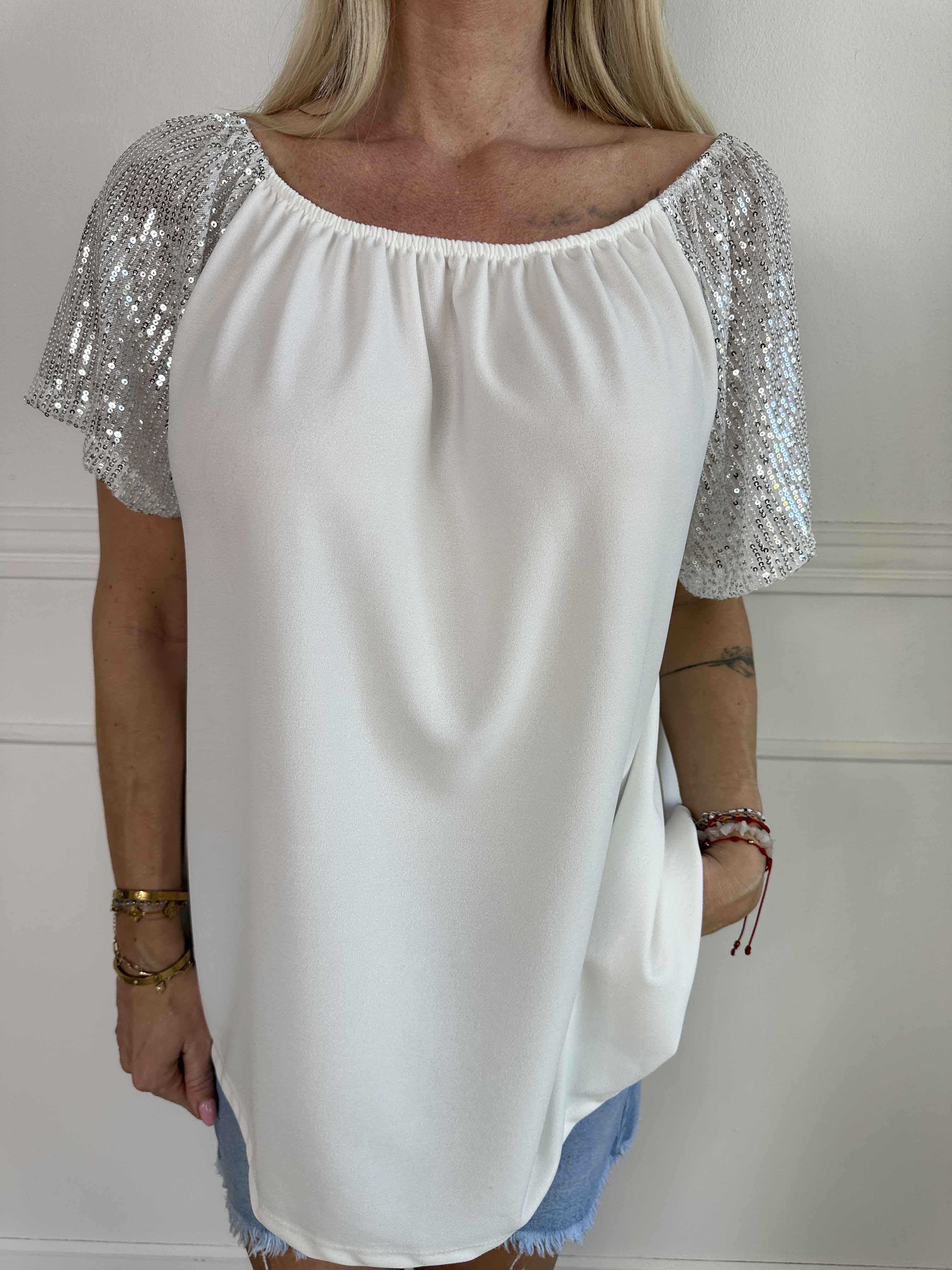Kim Shirt - Söt och feminin blus med resår och ärmar med glittriga paljetter