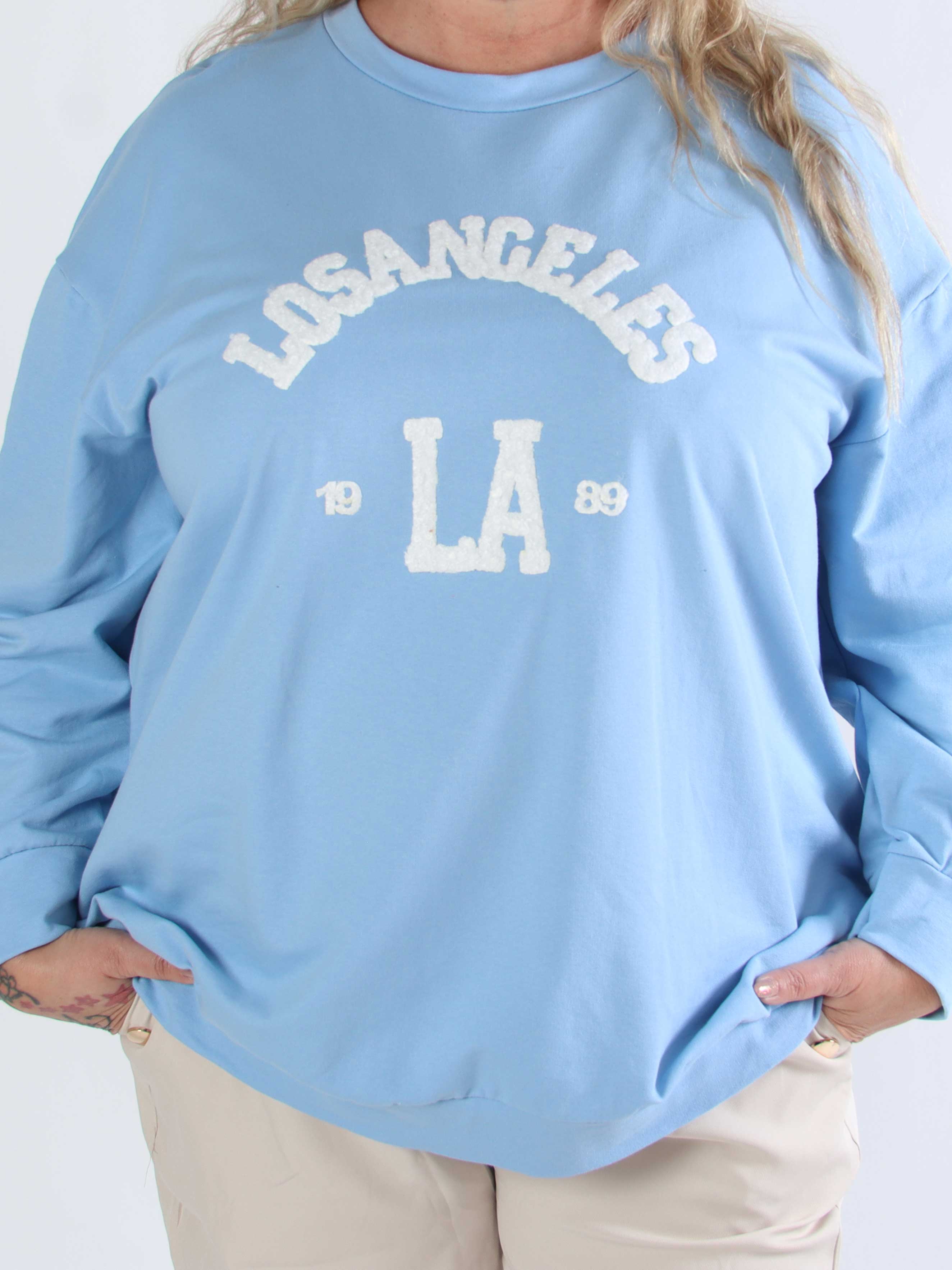 Magnolia - Plus size joggingtopp med LA skrivet i plysch