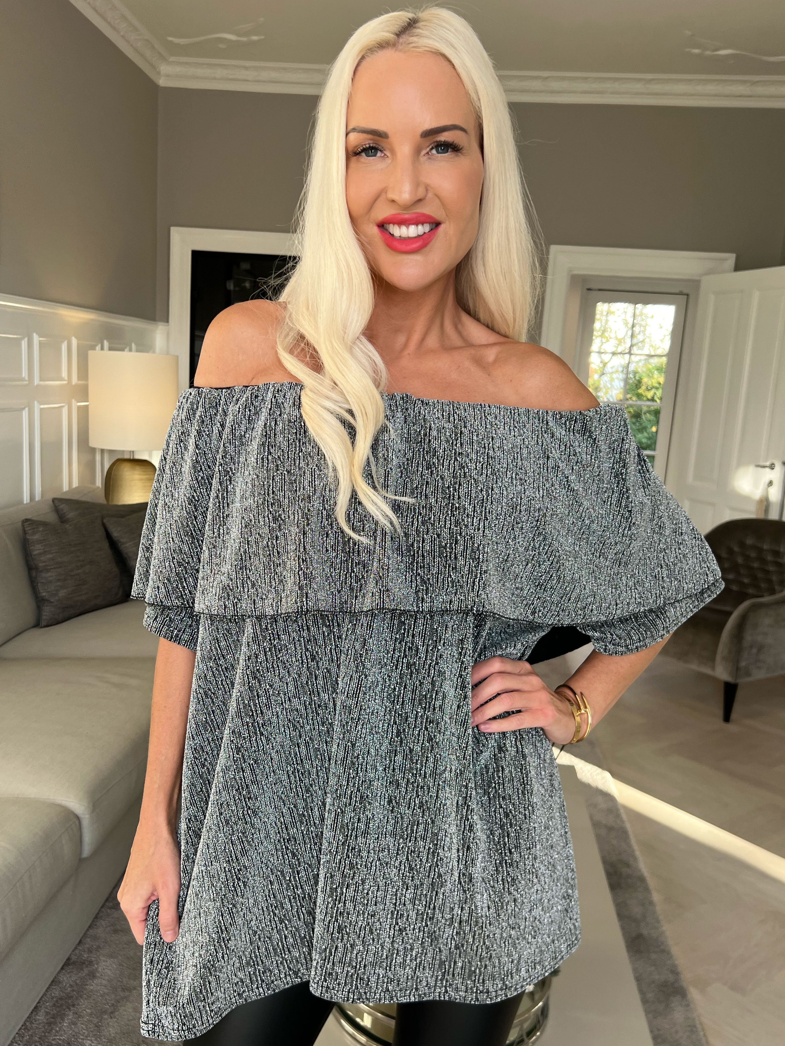 Maily - Off shoulder-blus med glittertrådar