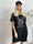 Mickey Dress - T-shirtklänning i bomull med kant i fuskpäls