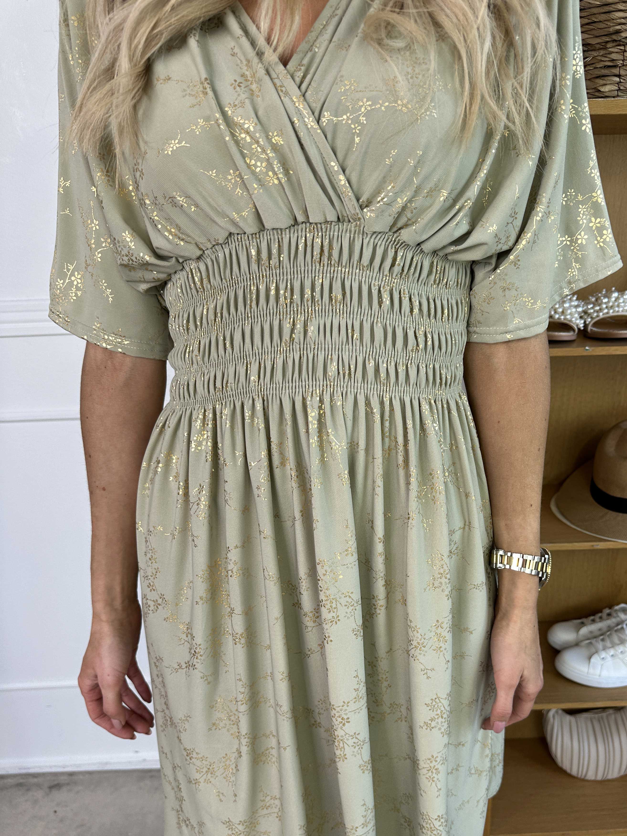 Pams Gold Short - Elastisk klänning detaljerad med guldblommor