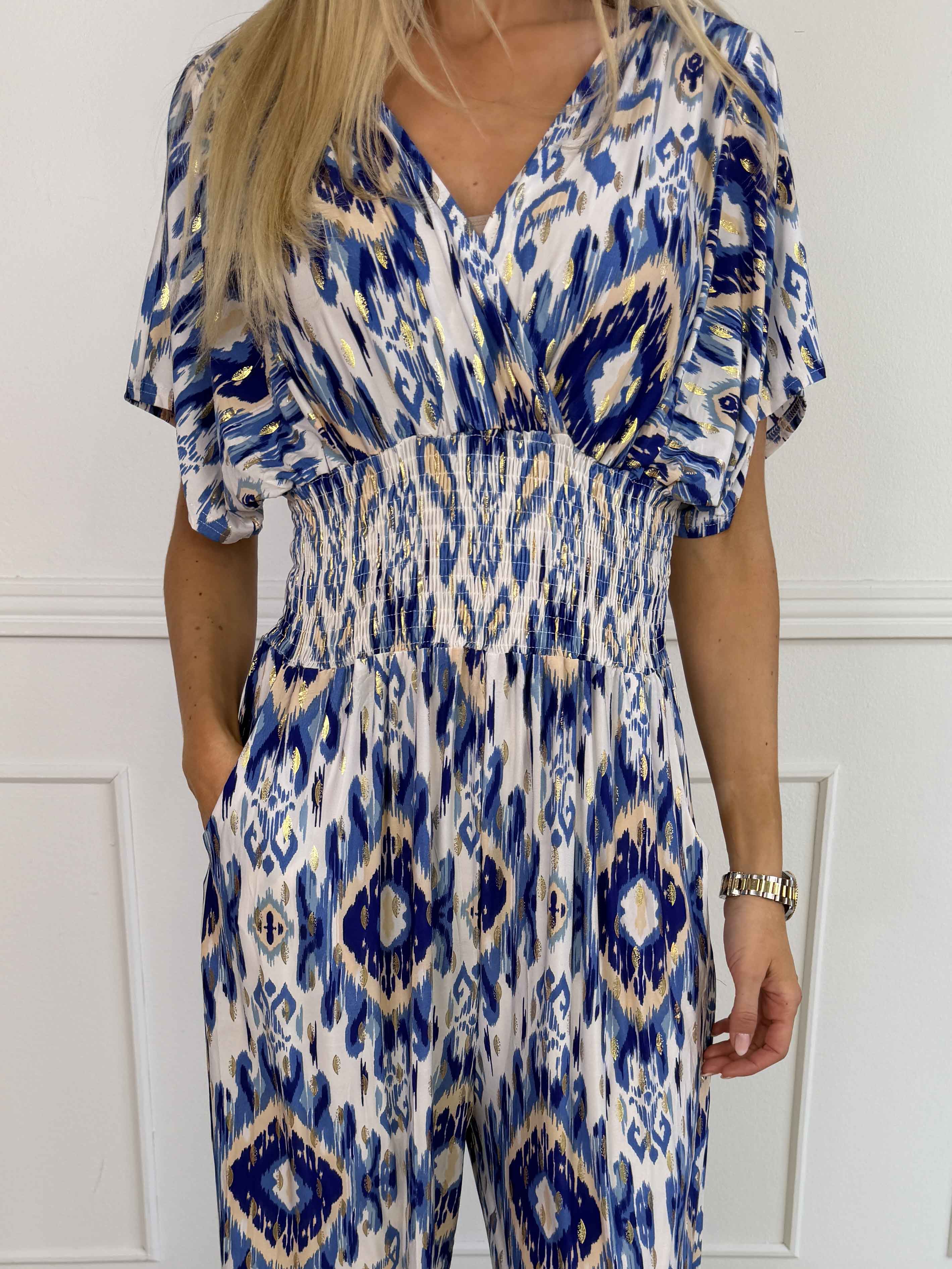 Pams Artsy Jumpsuit - Elastisk mønstret buksedragt med guld dutter