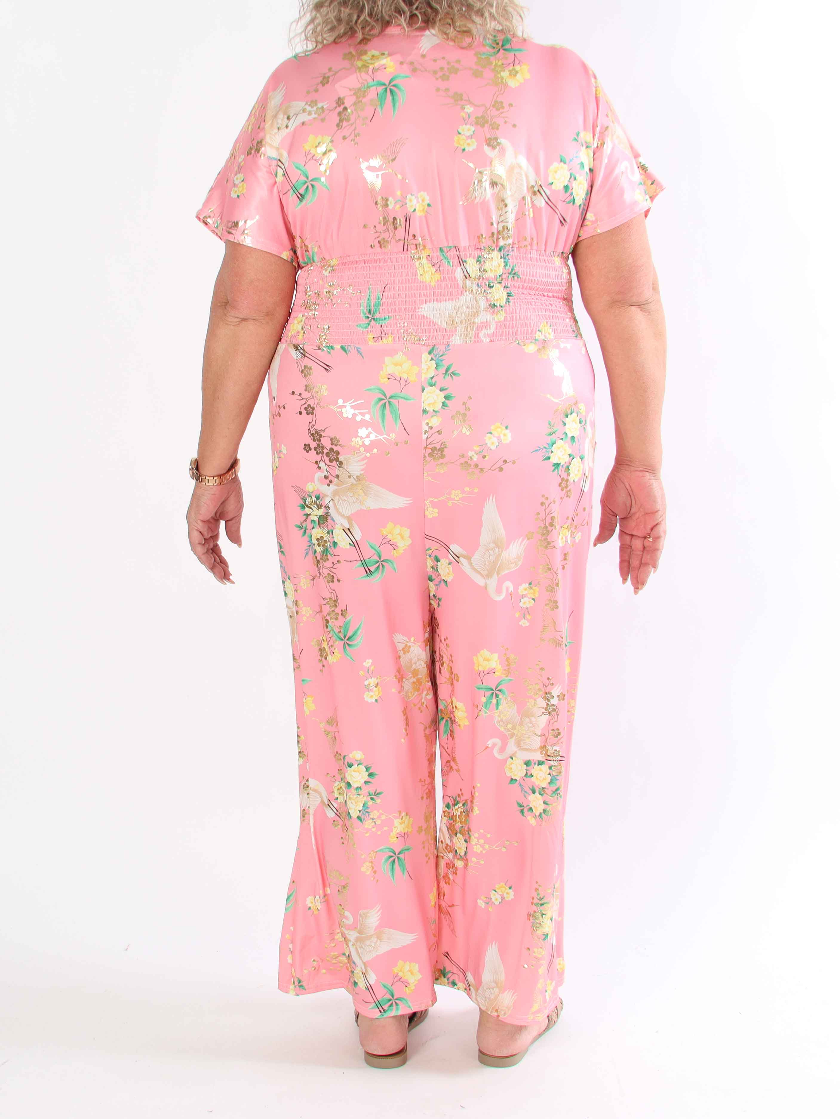 Pams Fly Jumpsuit - Elastisk plus size byxdress med blommor- och fåglemönster