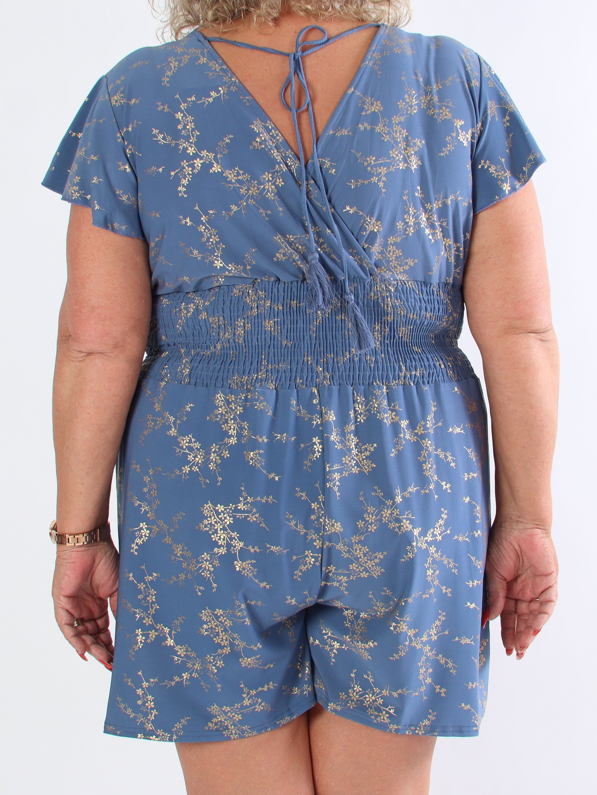 Pams Gold Playsuit - Elastisk jumpsuit i plusstorlek med guldtryck