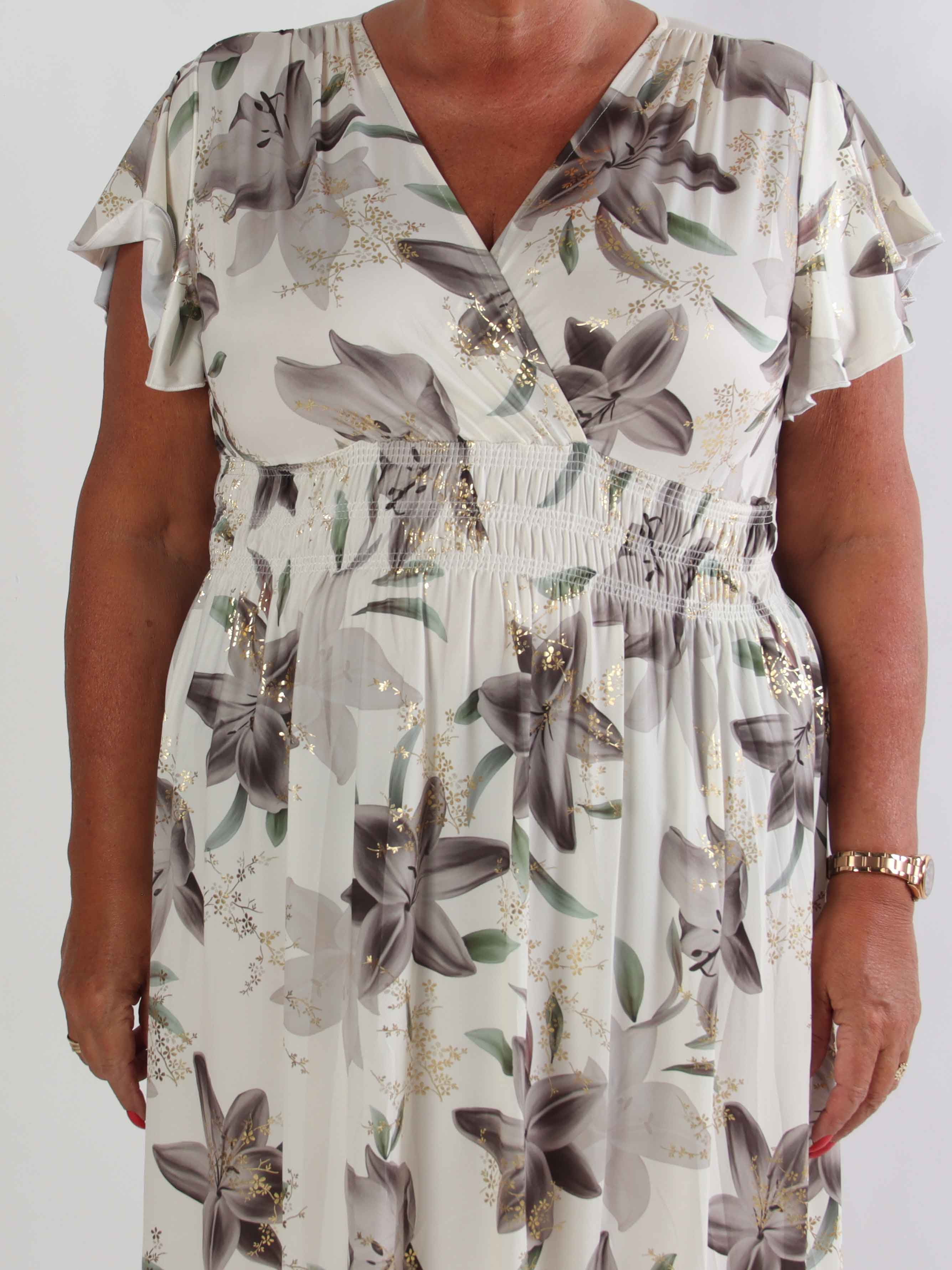 Pams Lilies - Elastisk plus size klänning med liljemönster och gulddetaljer
