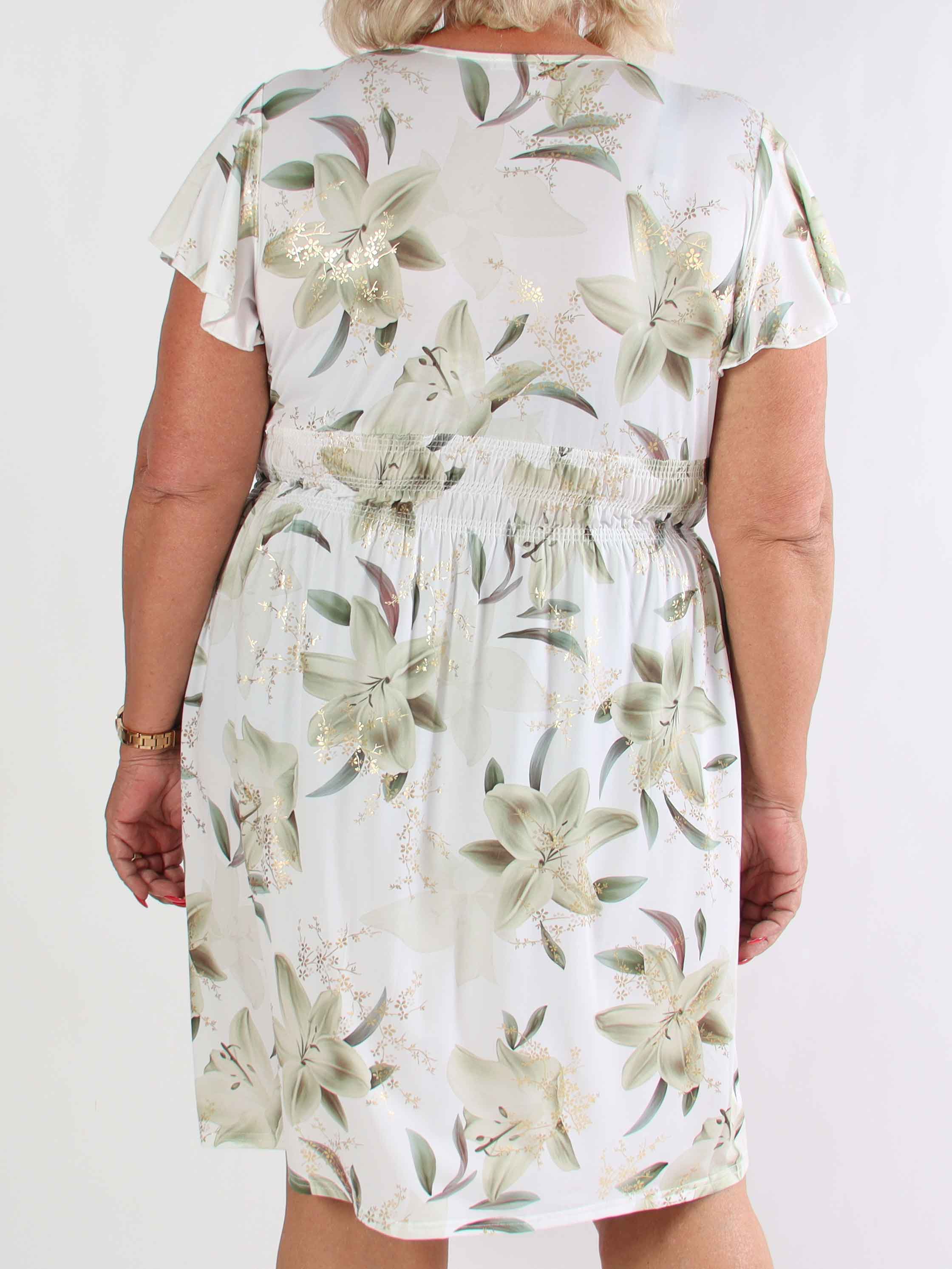 Pams Lilies Short - Kort elastisk plus size klänning med liljemönster och gulddetaljer