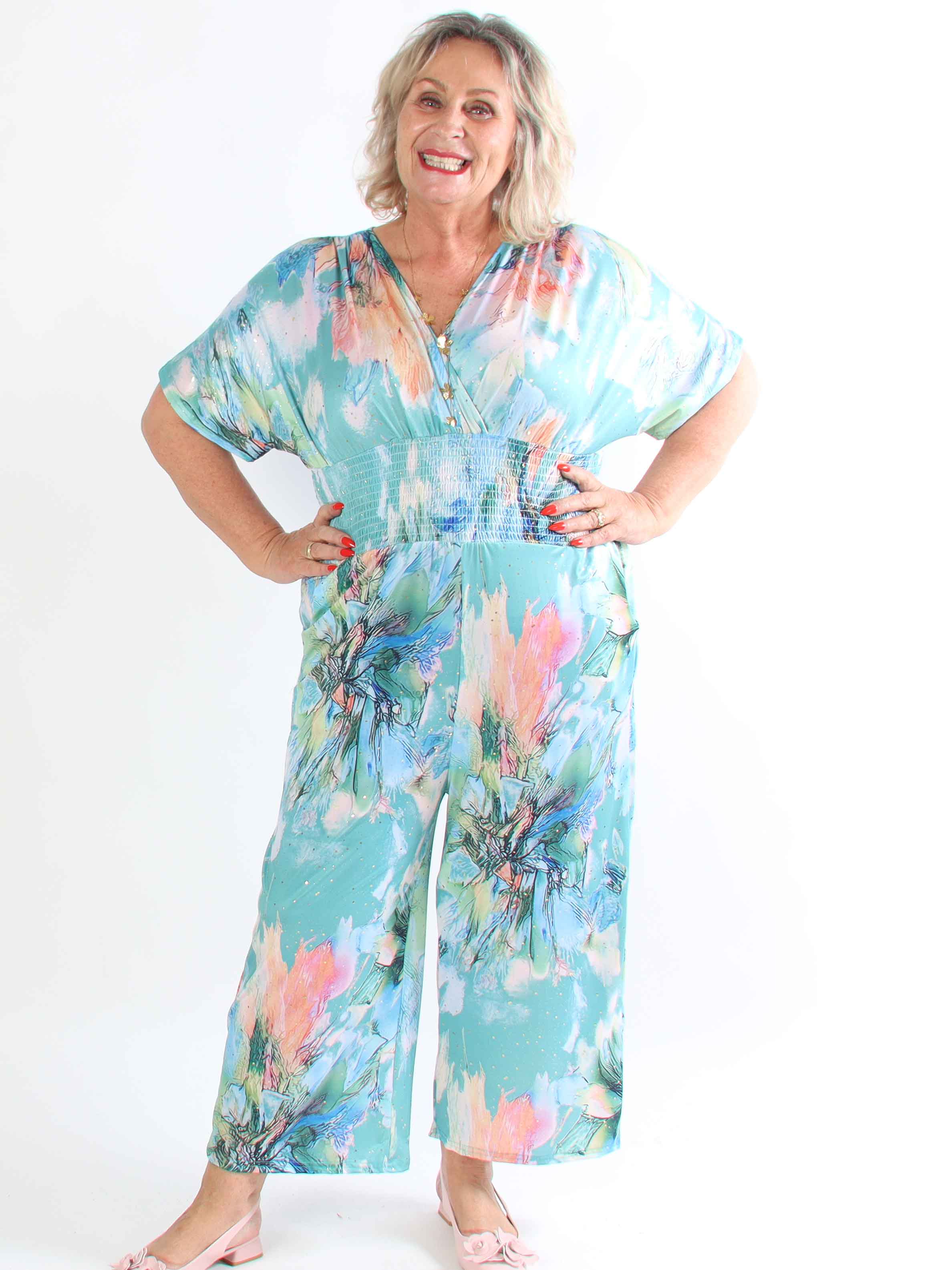 Pams Print Jumpsuit - Stretchig mönstrad plus size jumpsuit med guldfärgat damm