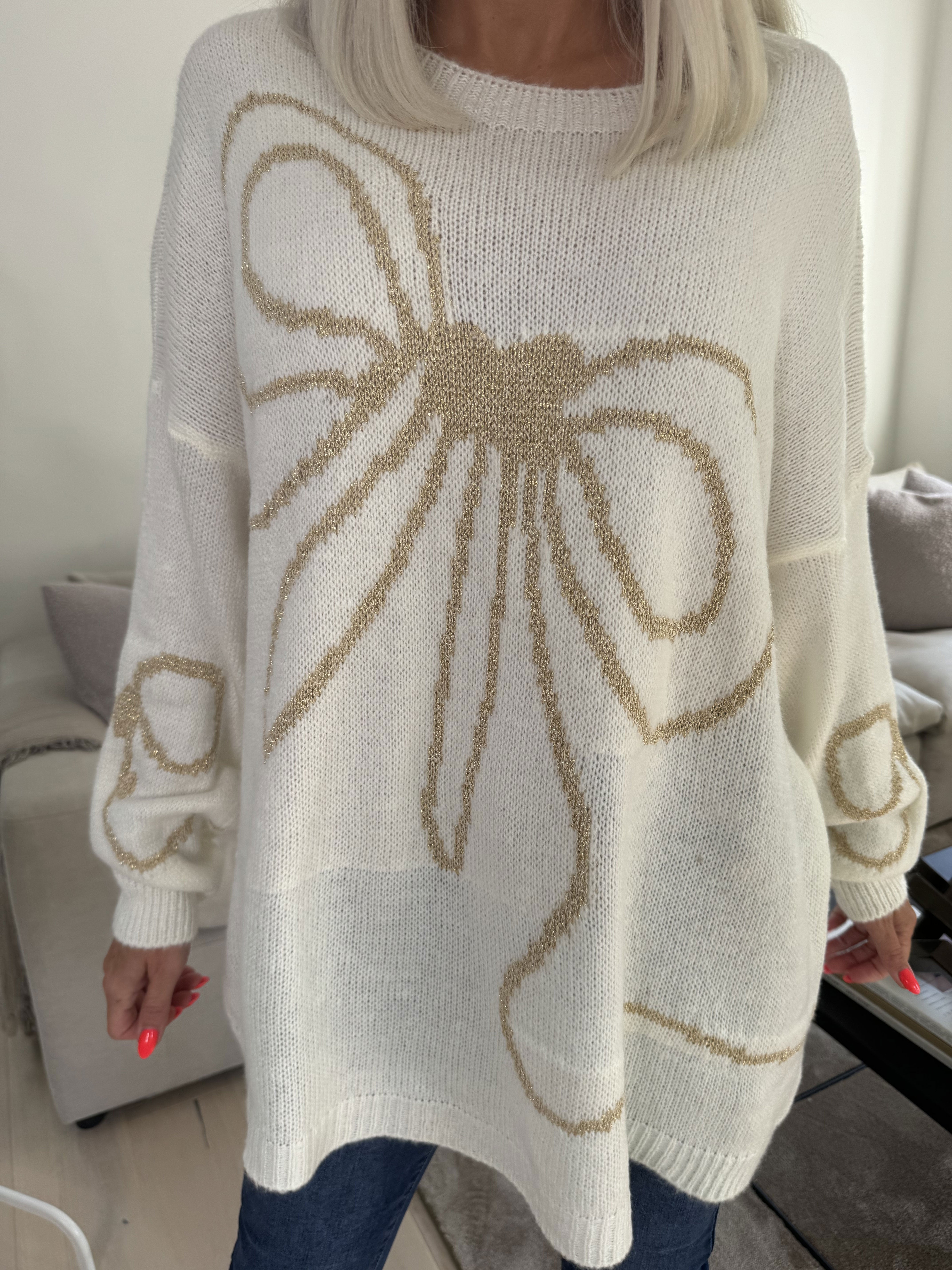Ruby - Stickad tröja med ull och rosett i guldtråd