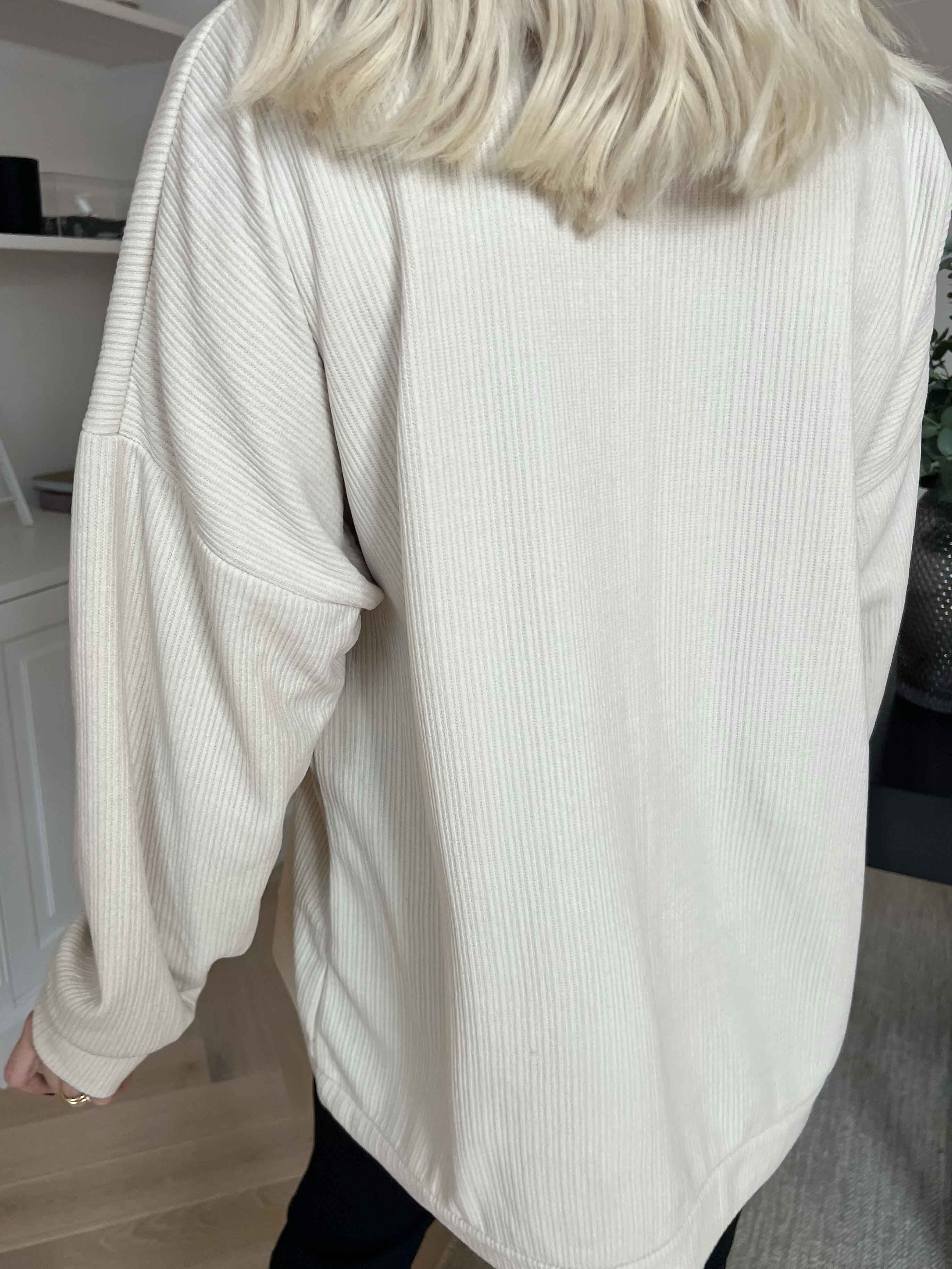 Uma - Blus i sammet med pärlor och strass