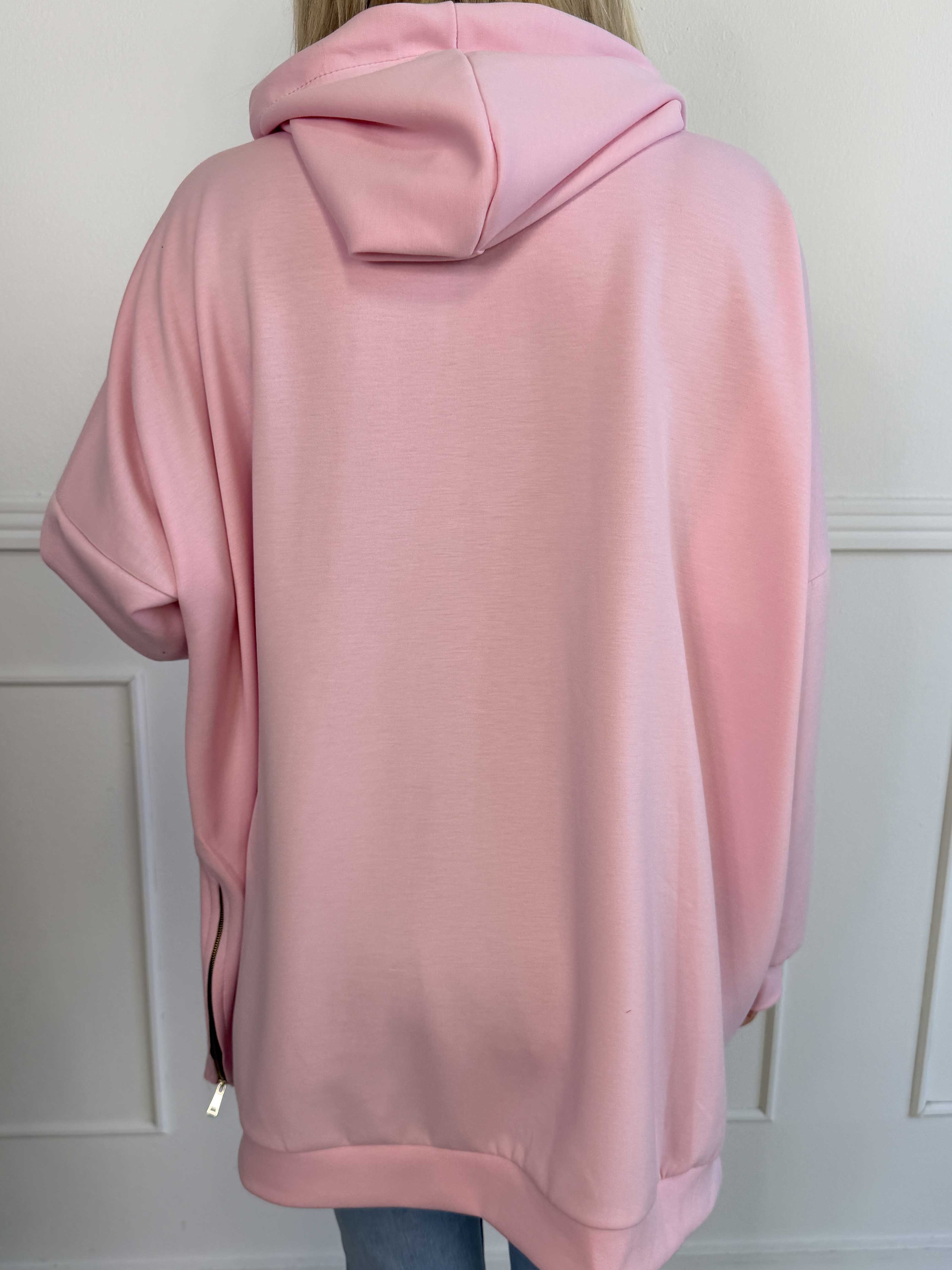 Victoria - Oversized hoodie med et pink mærke på ærmet