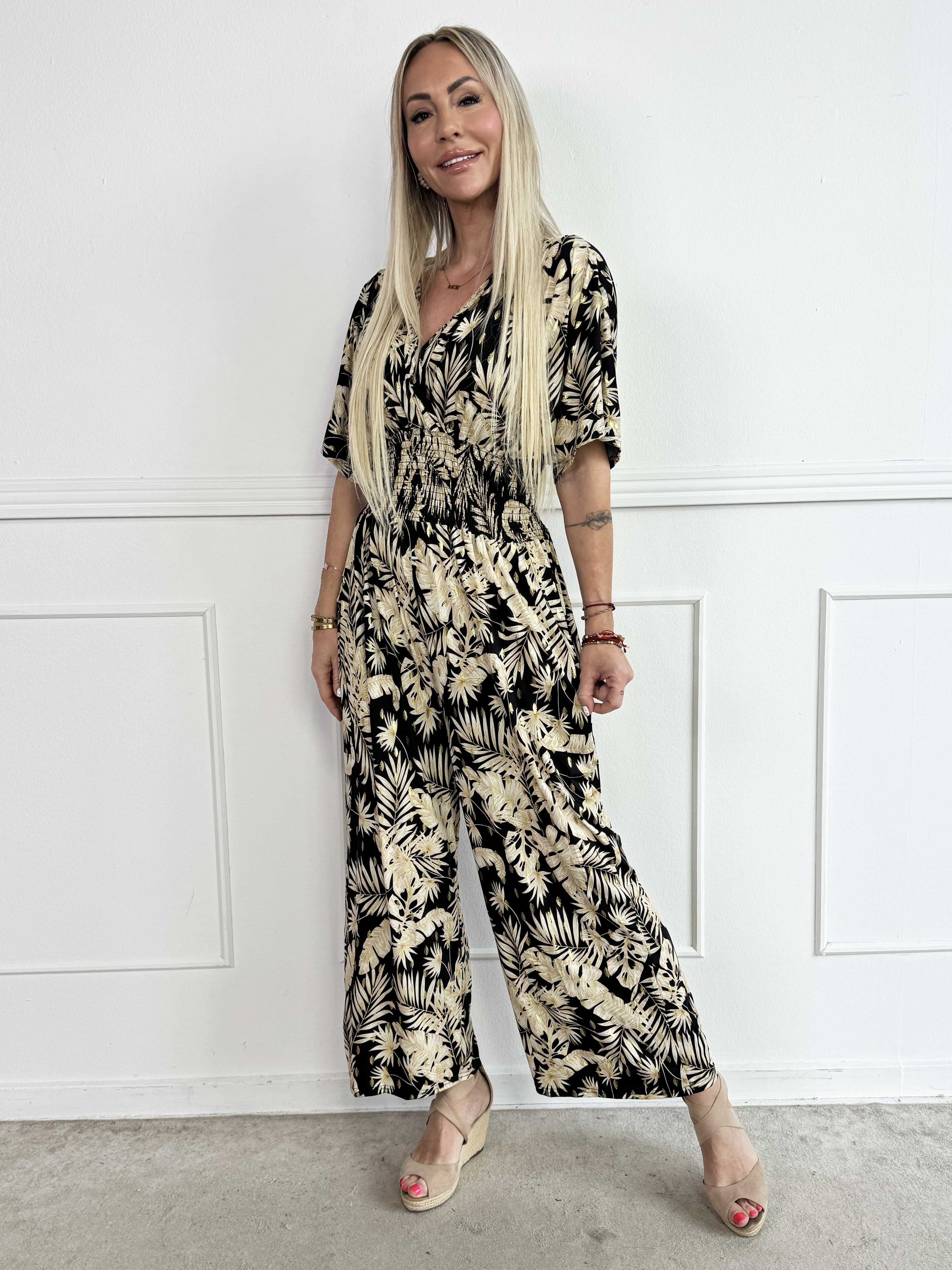 Pams Gold Leaf Jumpsuit - Elastisk buksedragt med blad mønster og guld dutter