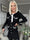 Unni - Feminin klänning med vita pärlor och rosett - Black