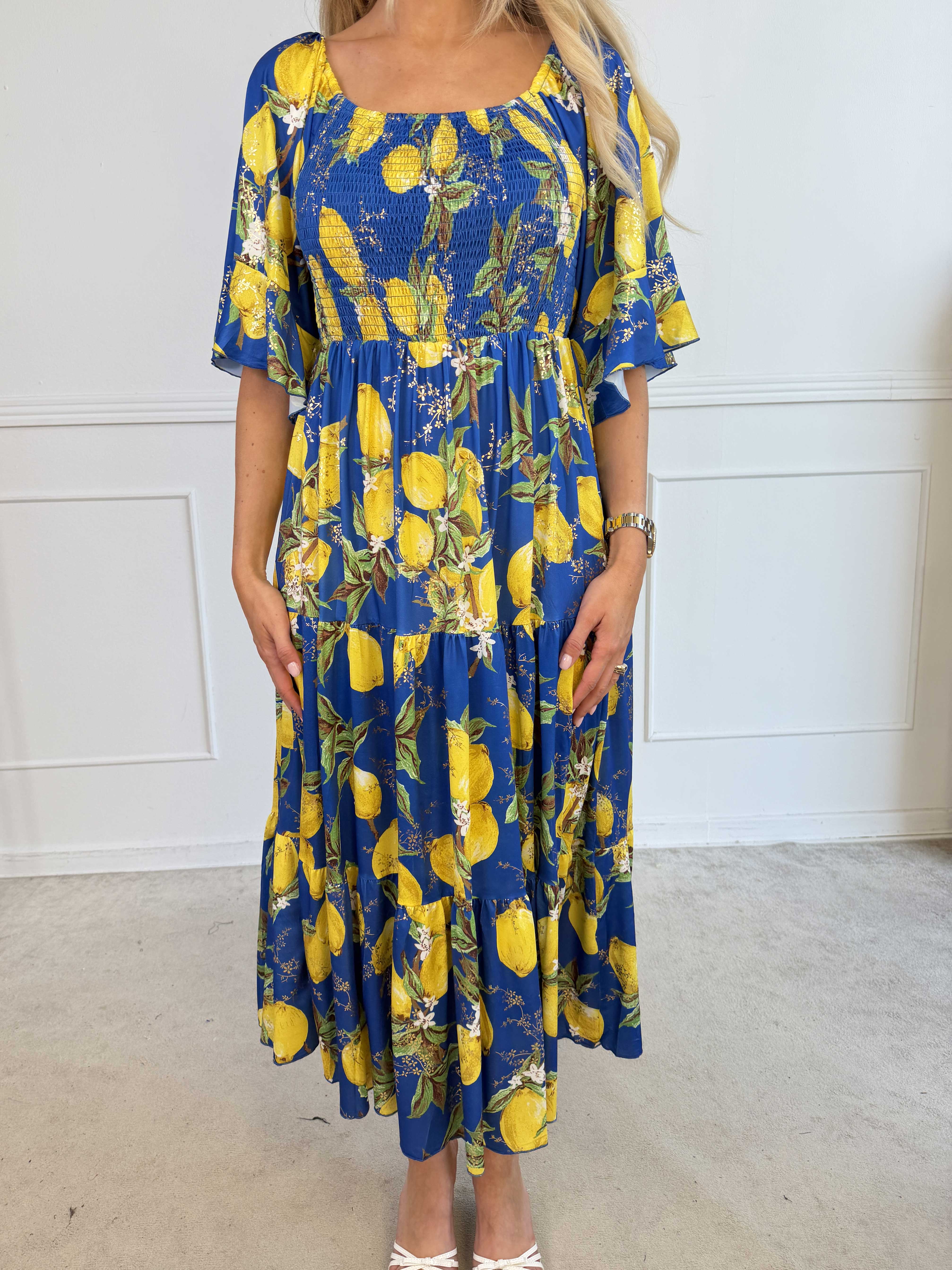 Elna Lemon - Lang elastisk kjole med citroner og smock over brystet