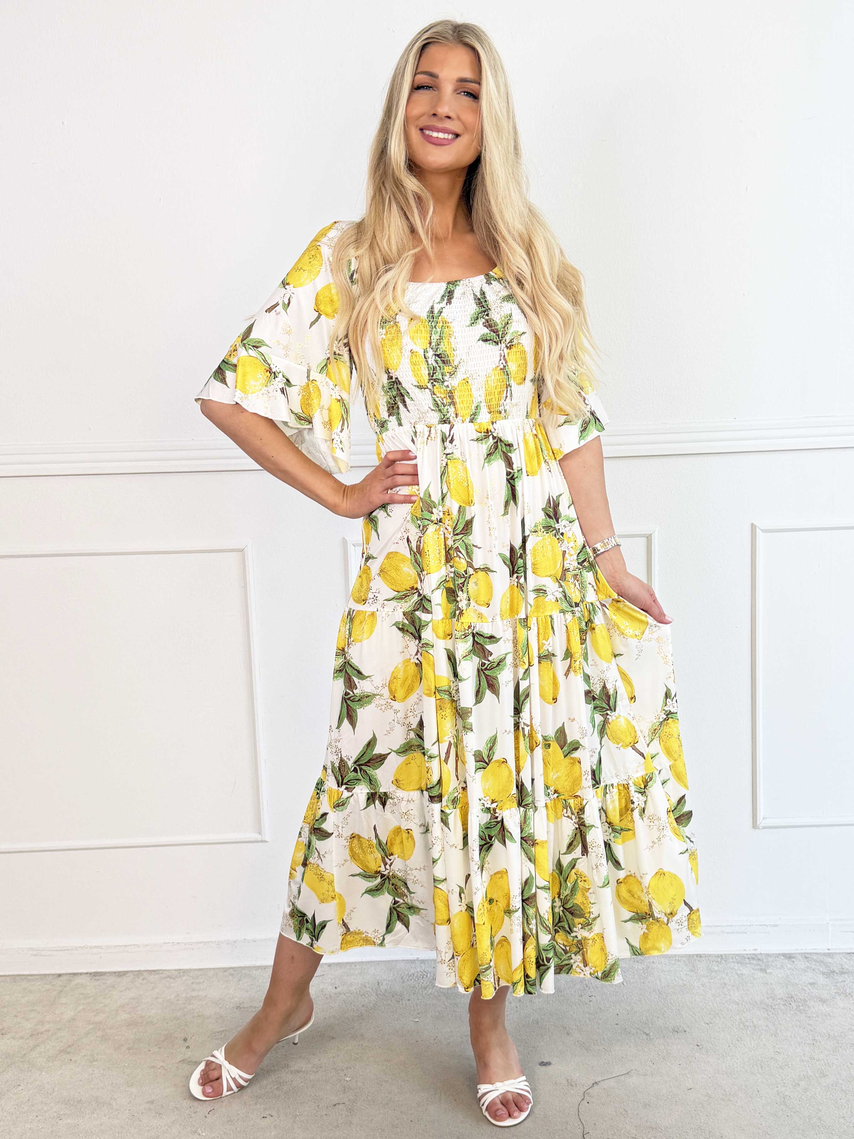 Elna Lemon - Lang elastisk kjole med citroner og smock over brystet
