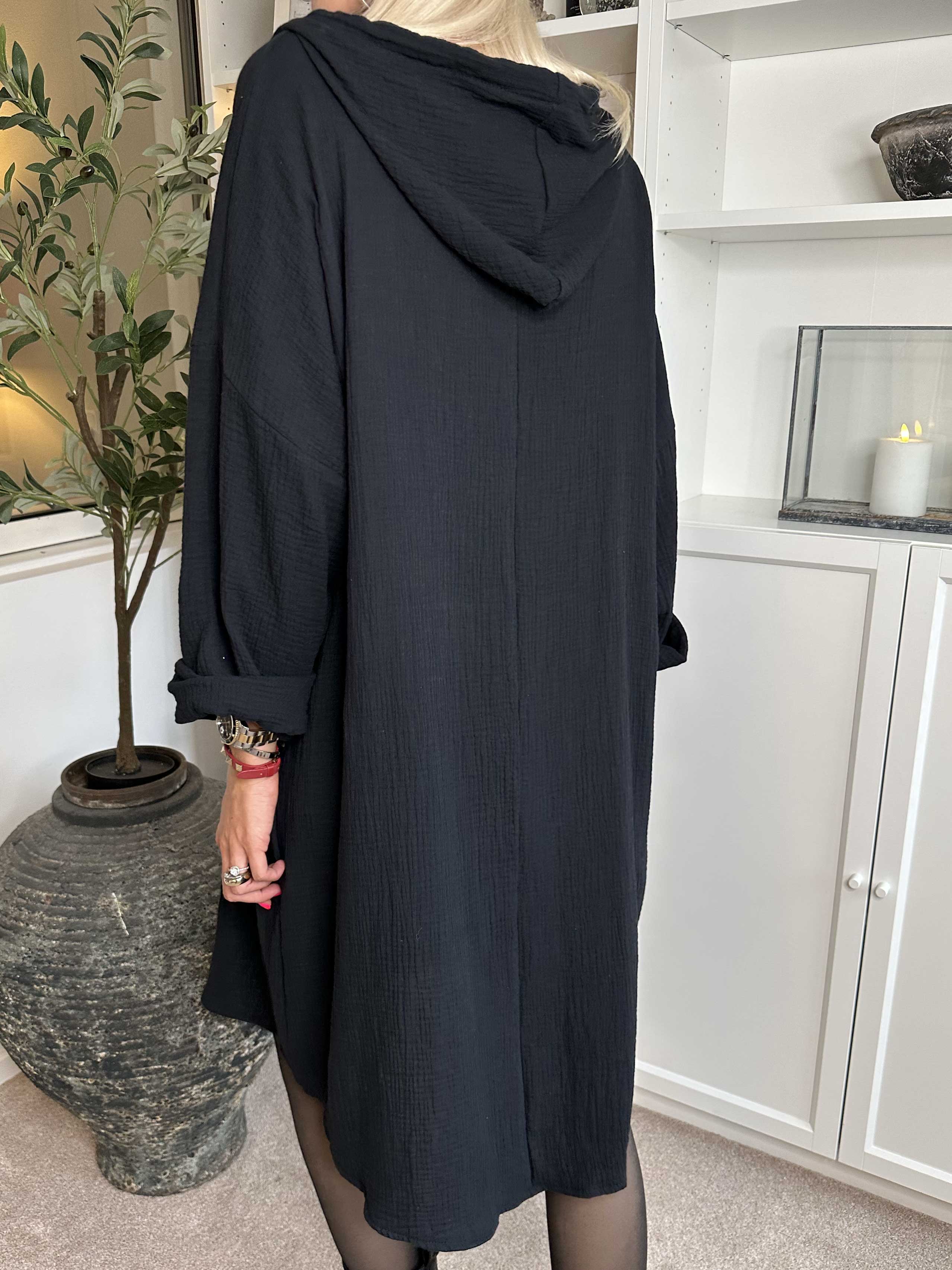 Caro - Mjuk oversized bomullsklänning med huva