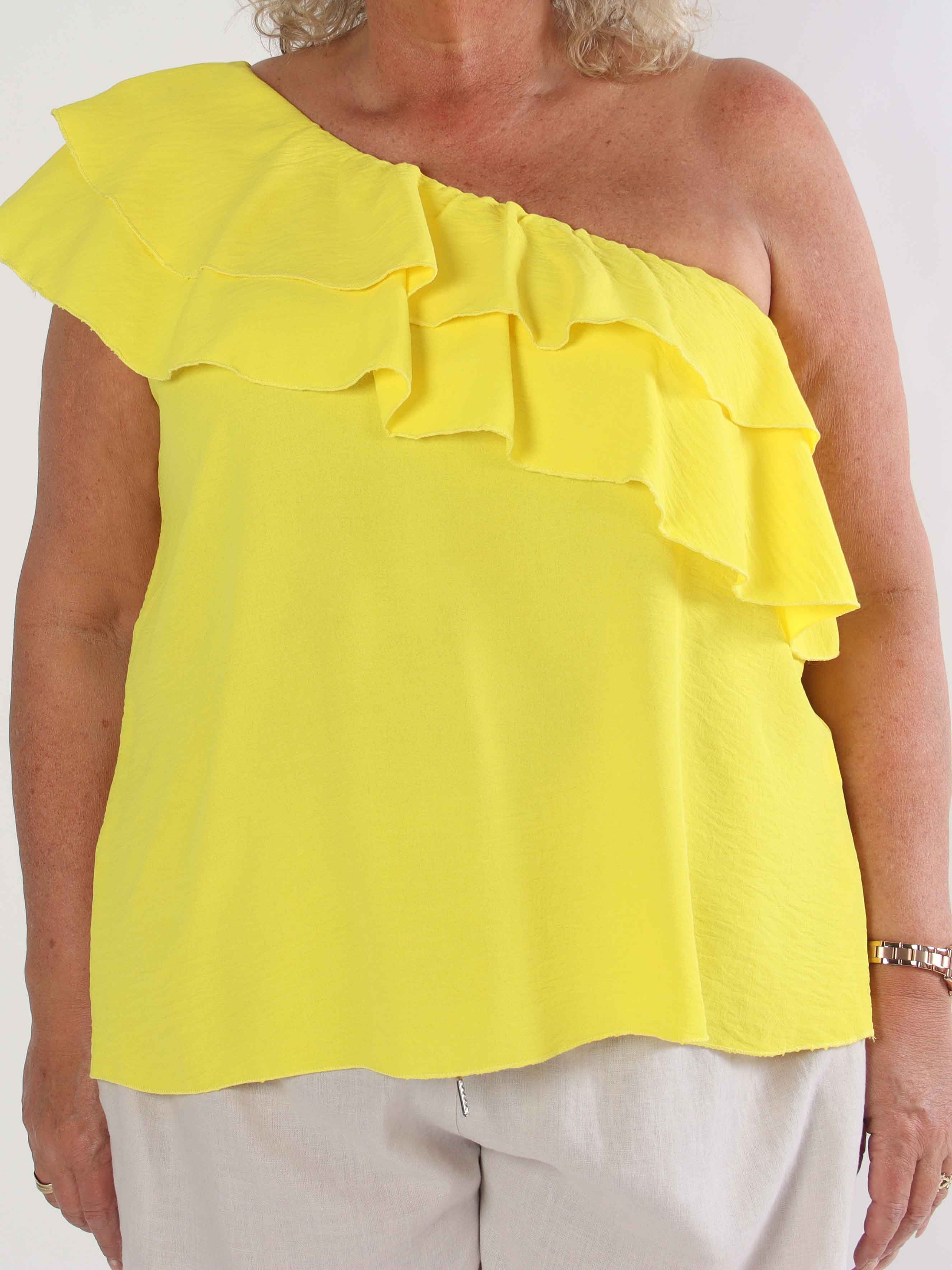 Catelyn Top - Söt one shoulder topp med volanger