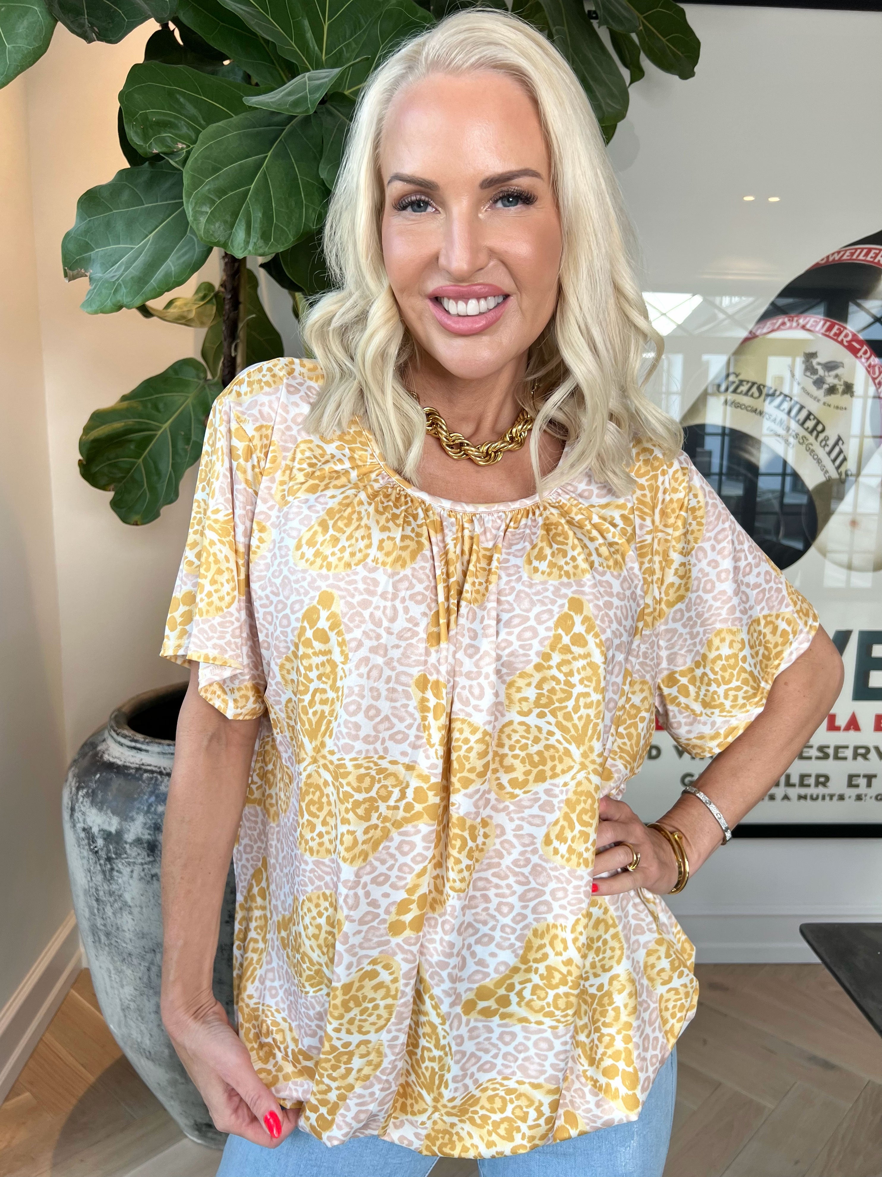 Miracle Butterfly - T-shirt med leopardtryck, fjäril och resår nedtill för en ledig look