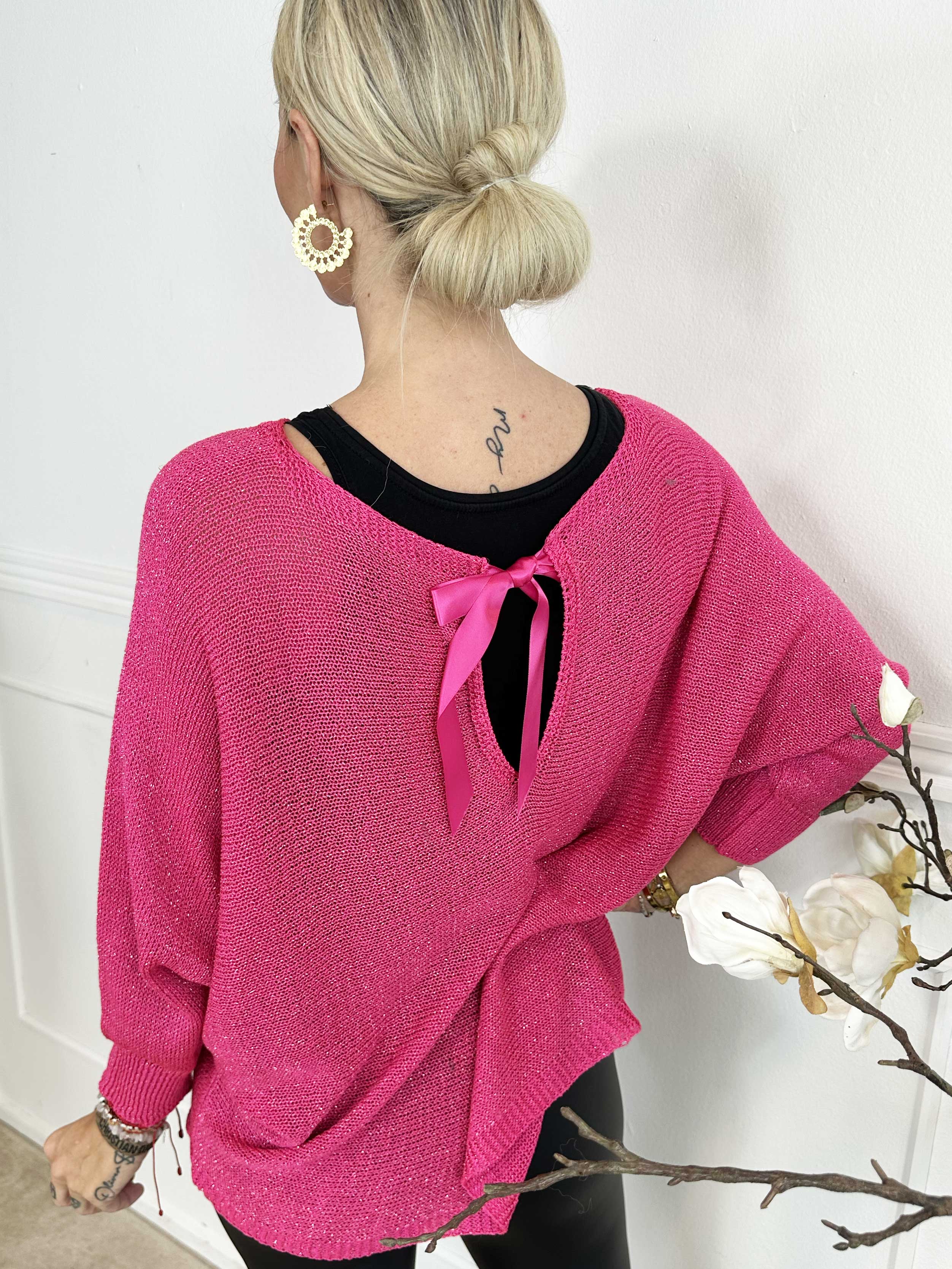 Paulina - Stickad blus med glittertrådar och rosett