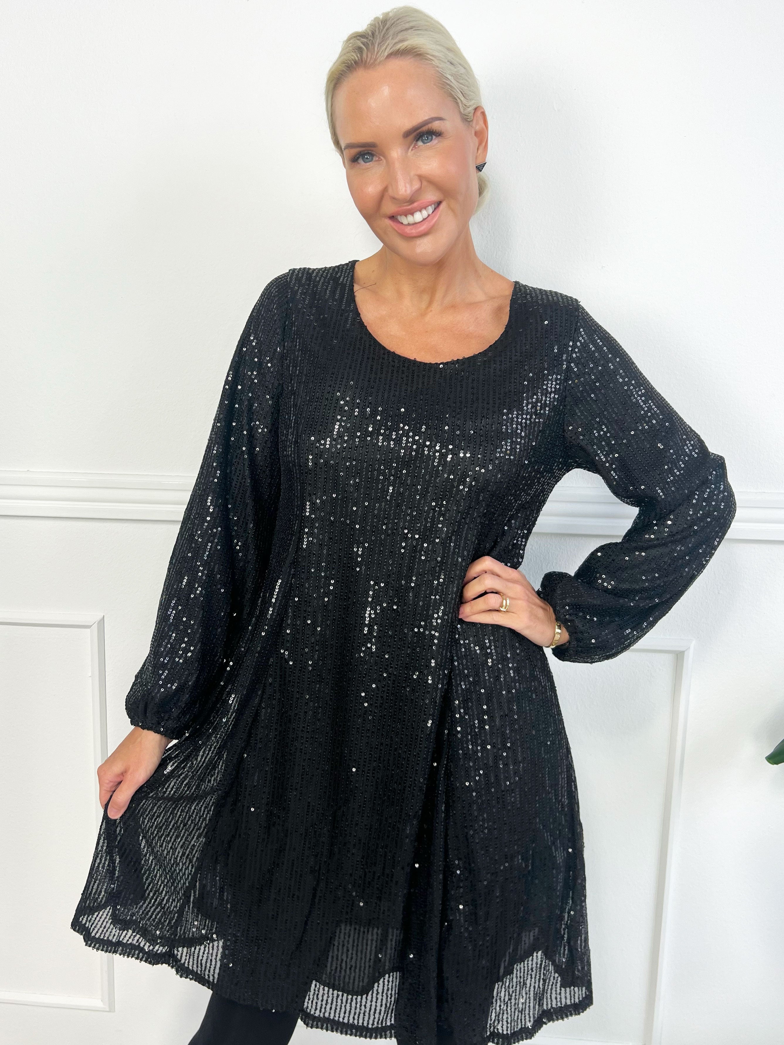 Maj Glitter L/S - Söt paljettklänning som går ut i en A-linjeform
