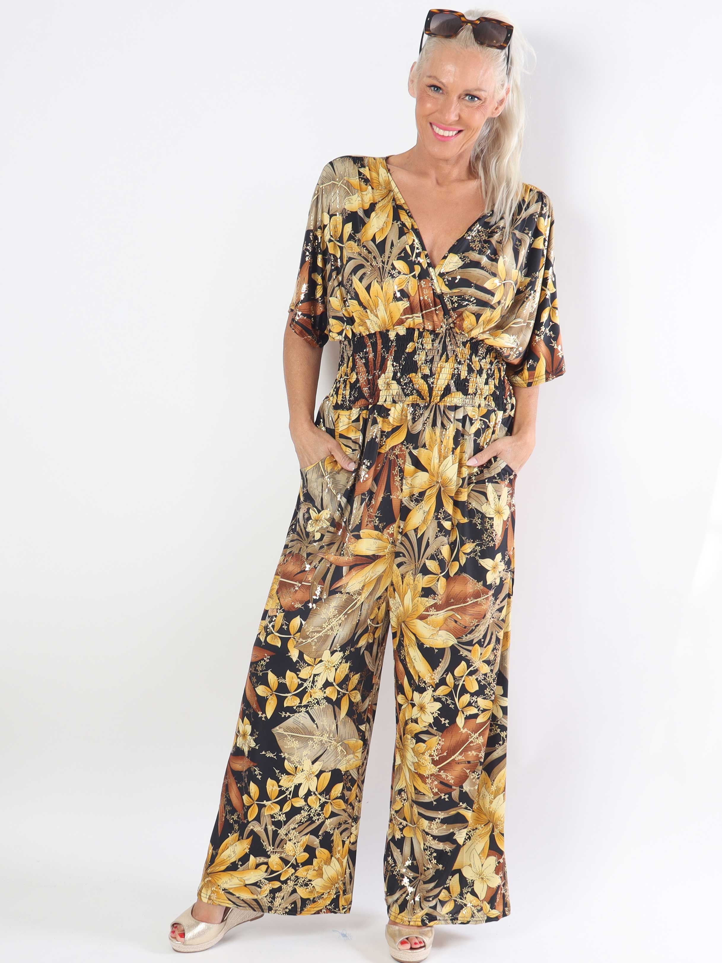 Pams Jumpsuit - Elastisk jumpsuit i plusstorlek med bladmönster