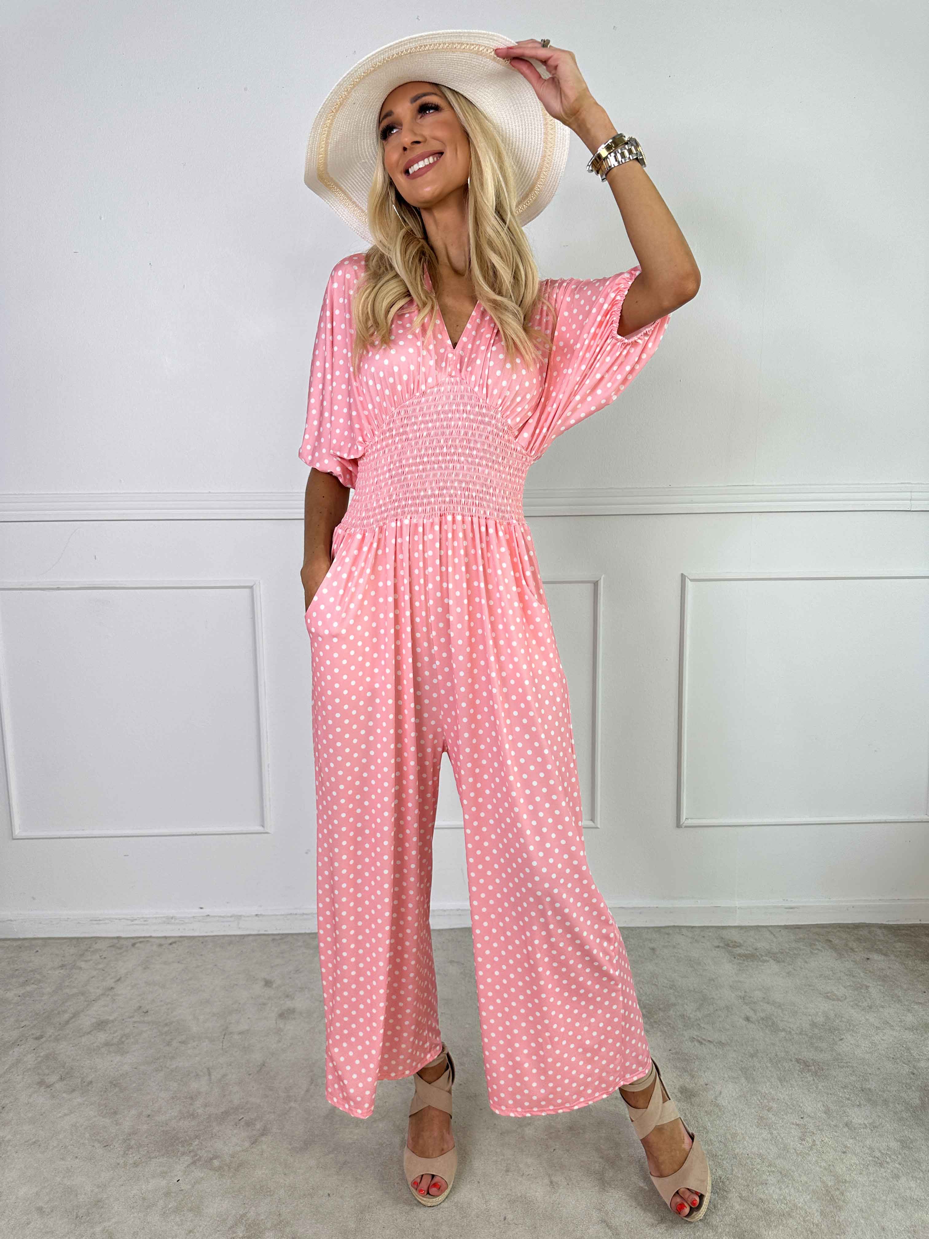 Grace - Stretchig jumpsuit med vita prickar