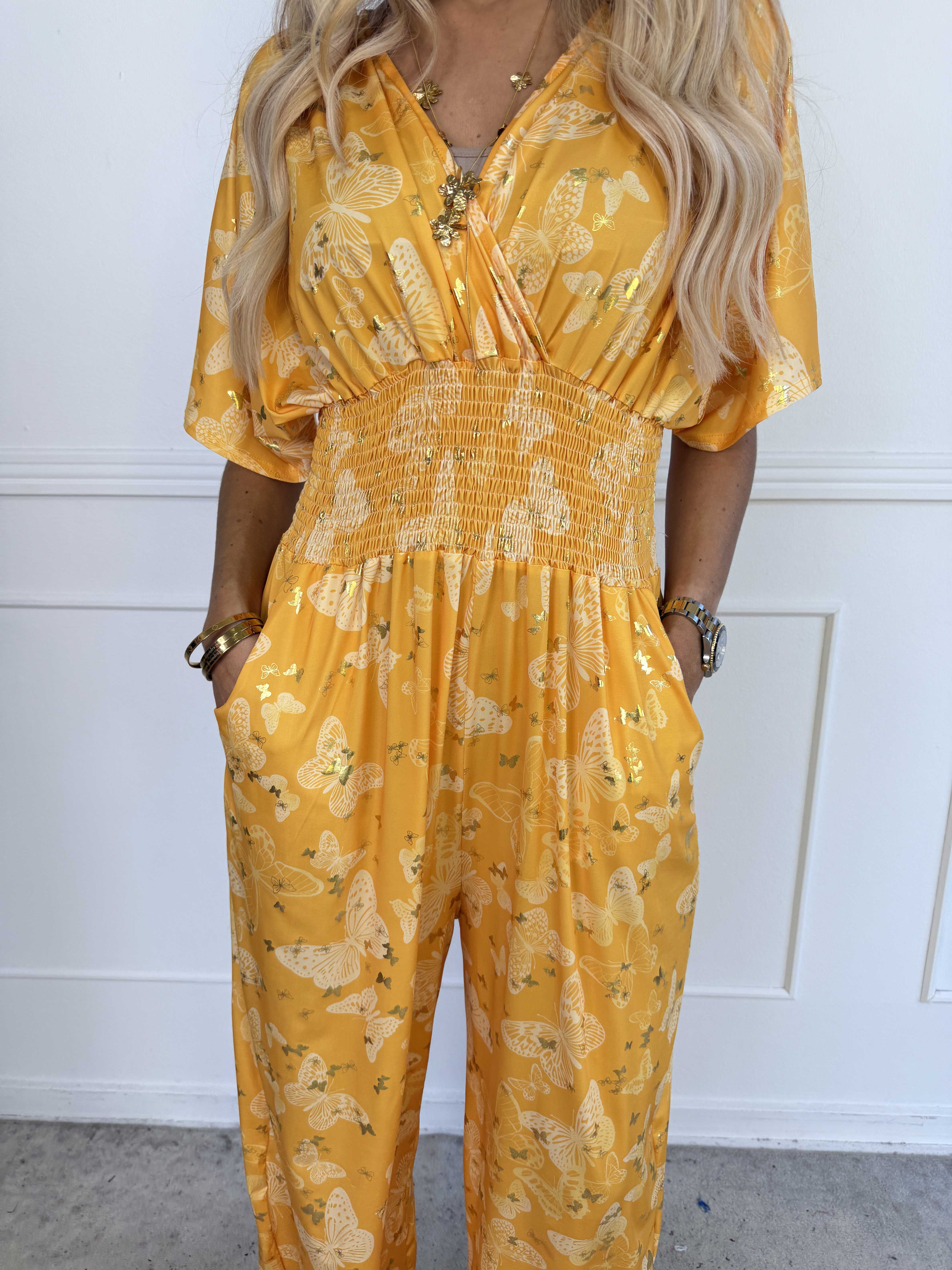Pams Butterfly Jumpsuit - Elastisk plus size jumpsuit med fjärilsmönster