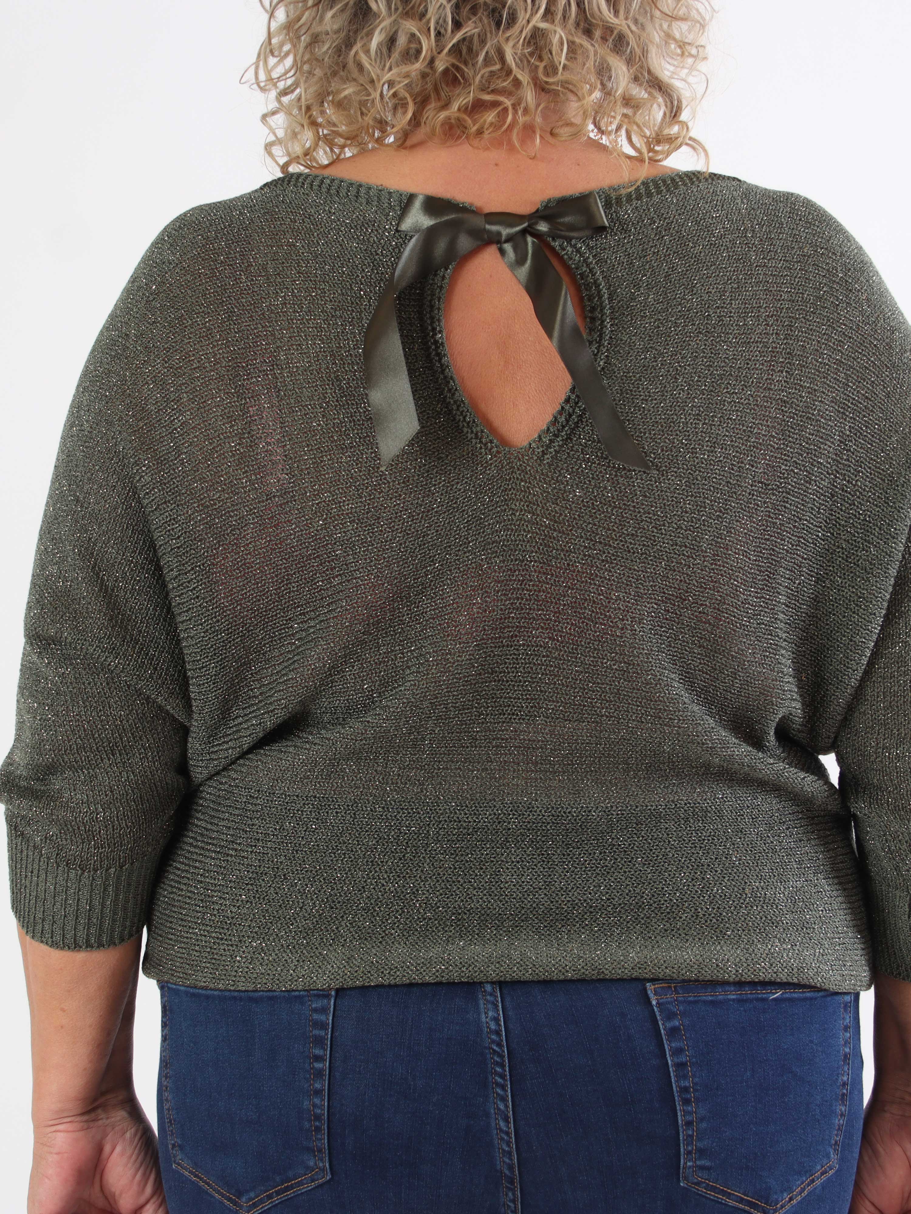 Paulina - Stickad blus i plus size med glittertrådar och rosett