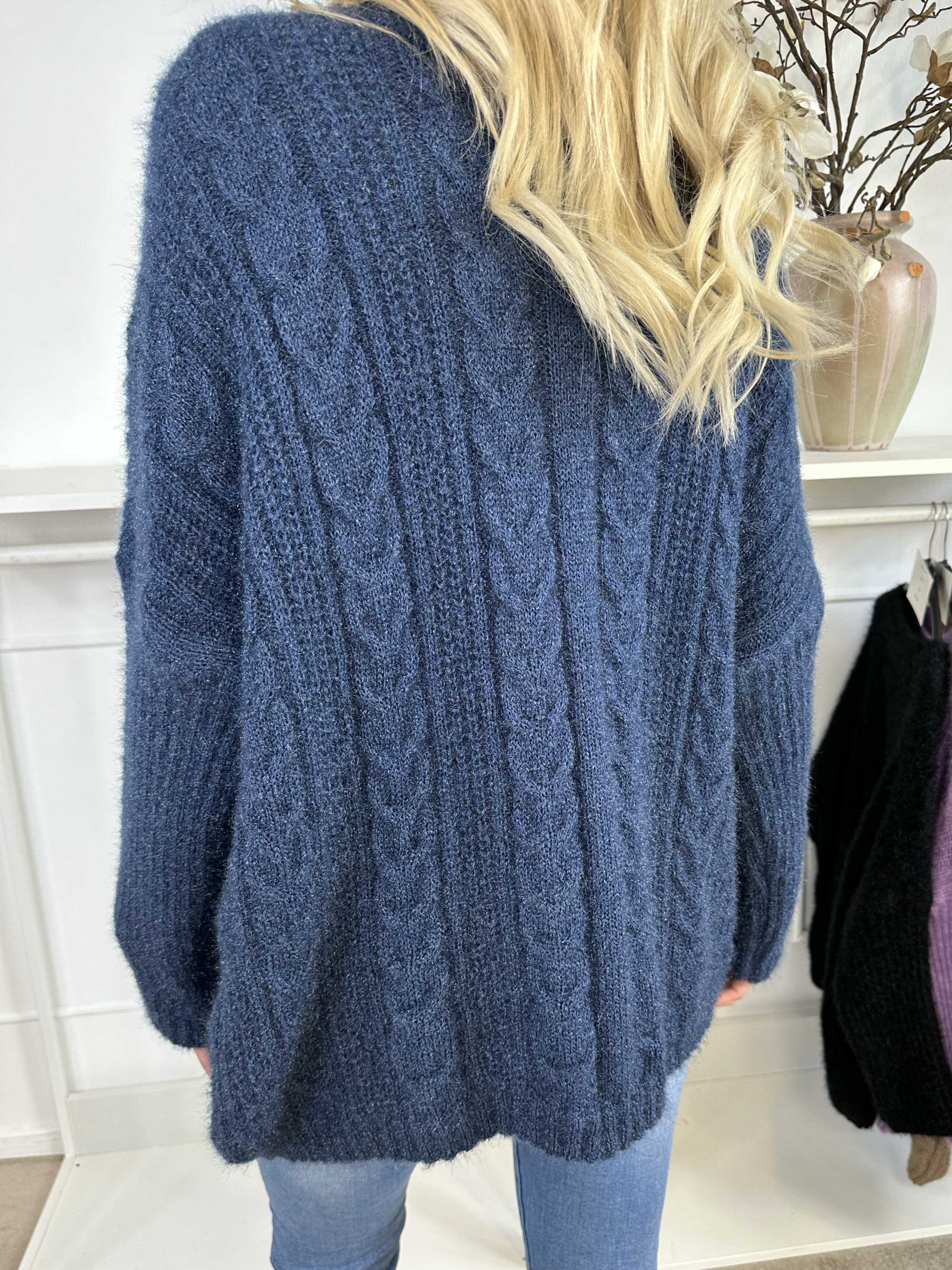 Johanna - Stickad blus i glansig trikå