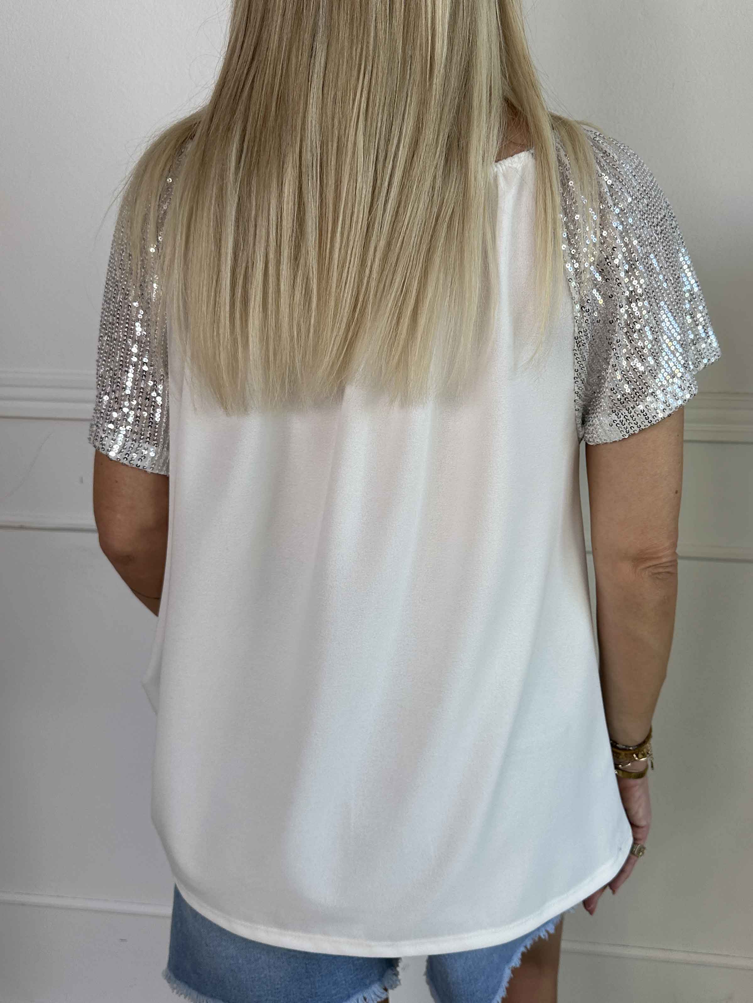 Kim Shirt - Söt och feminin blus med resår och ärmar med glittriga paljetter