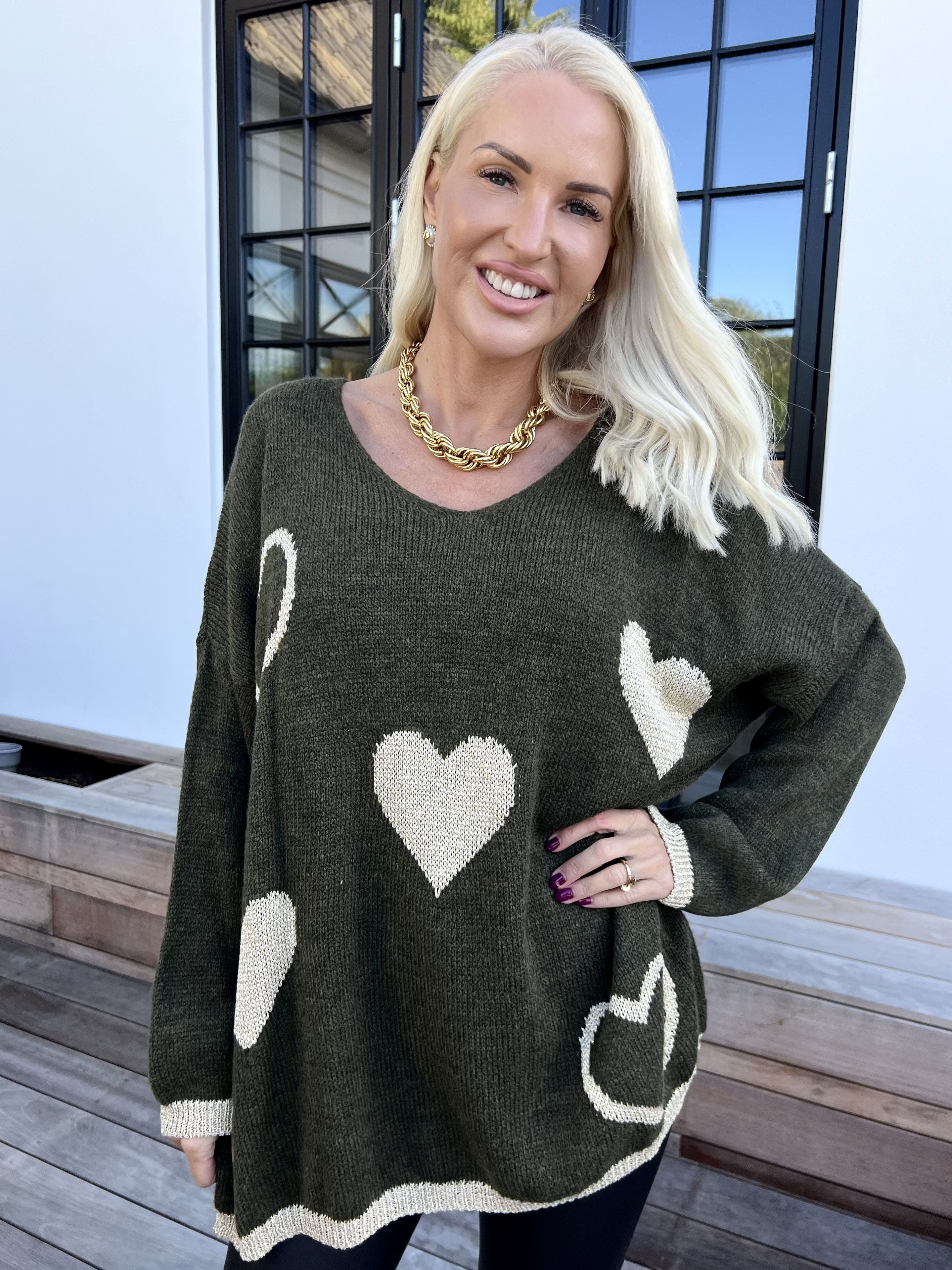 Lydia - Stickad tröja med hjärtan i guldfärgad glittertråd