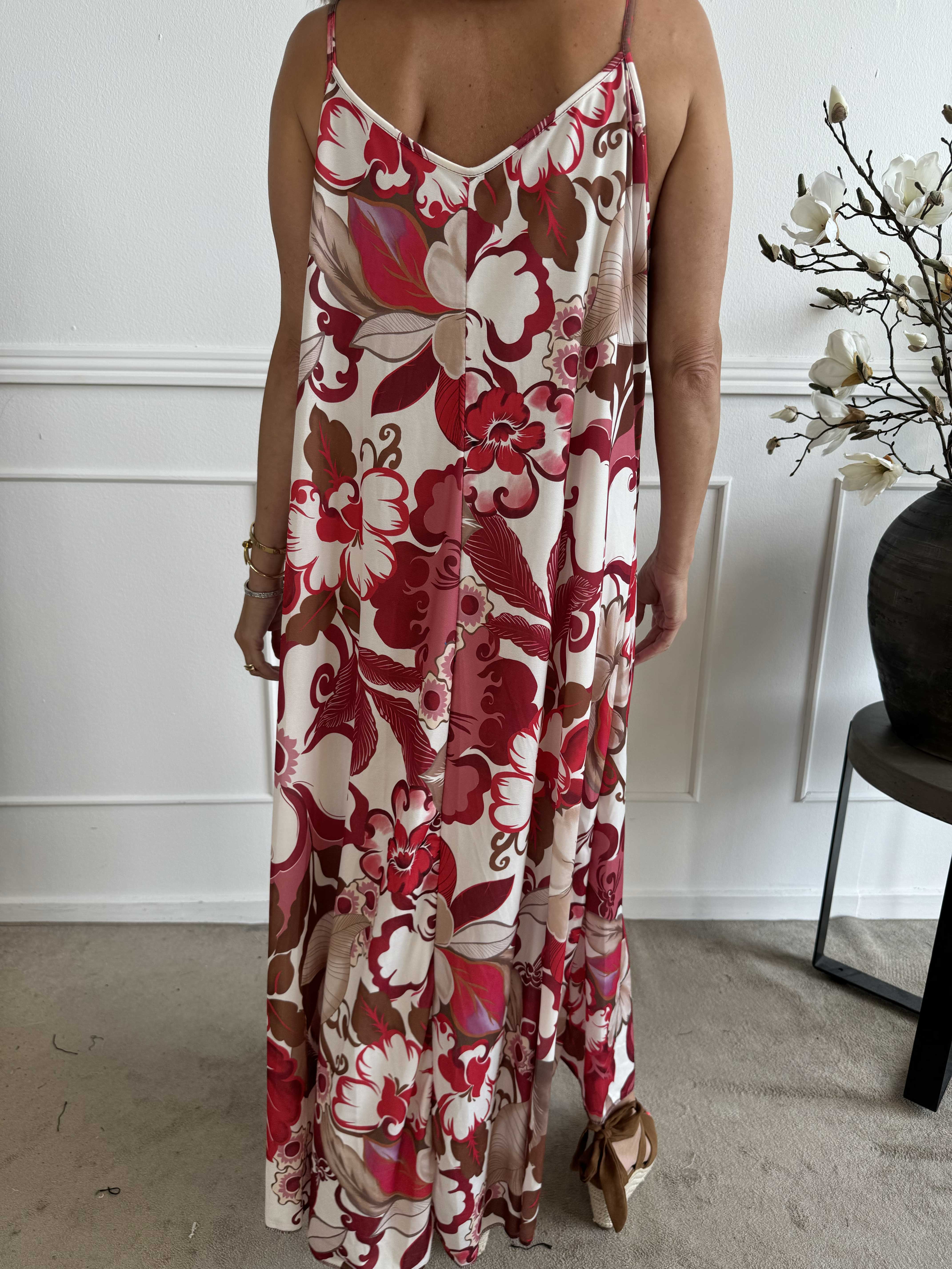 Maija - Axelbandsklänning i elastiskt tyg med blommor