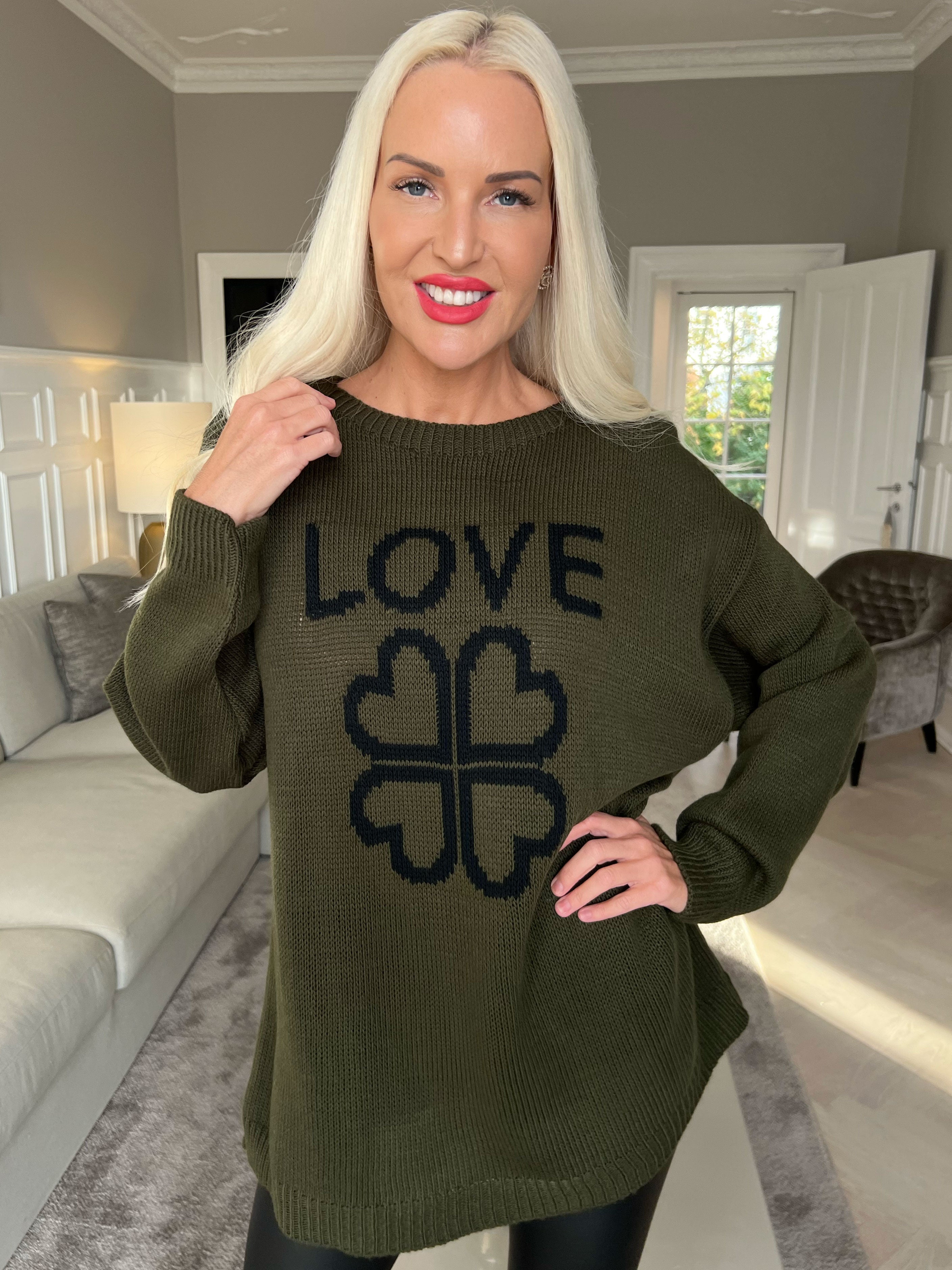 Mia - Stickad blus med fyrklövermotiv