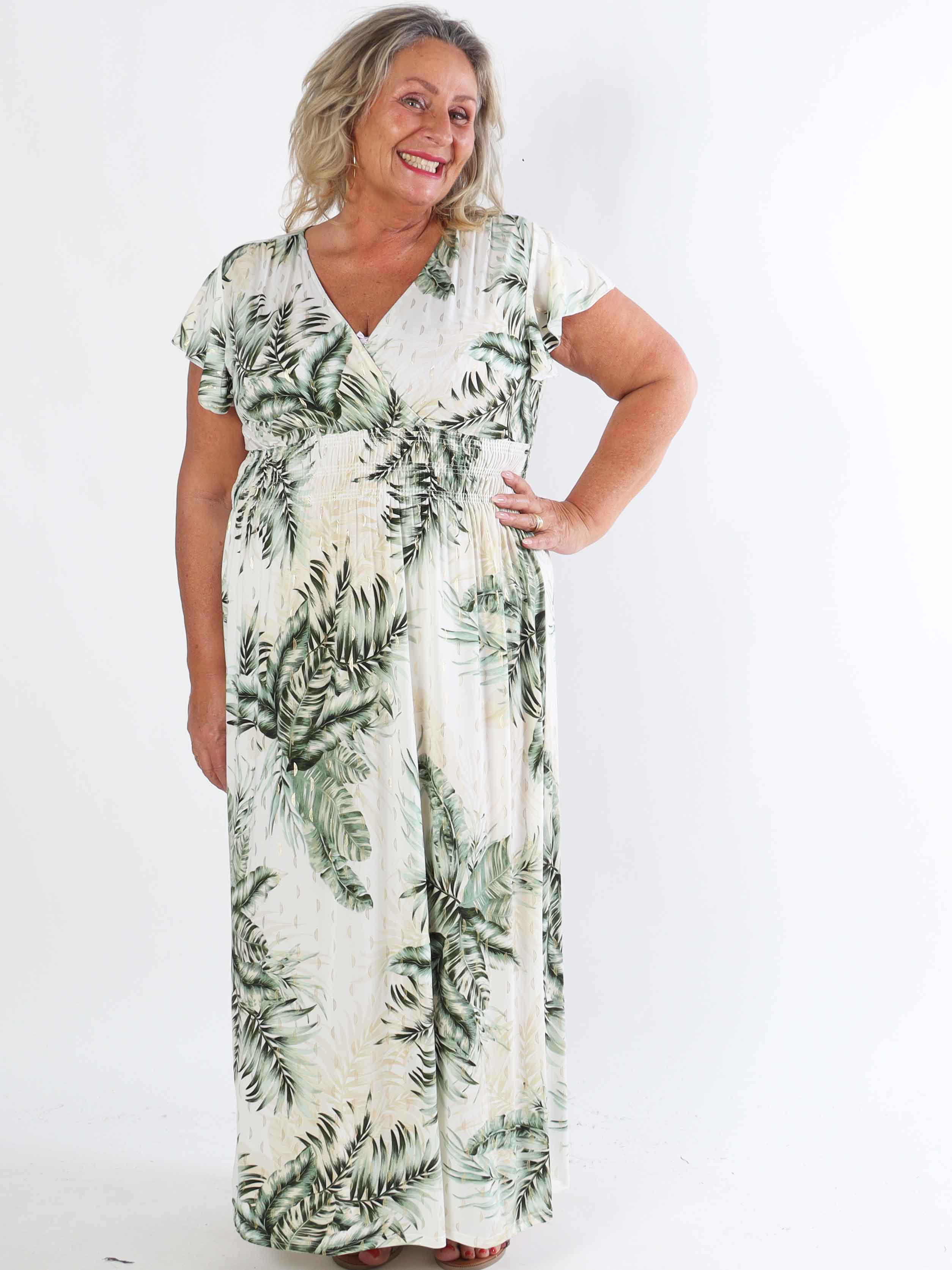Palma - Elastisk klänning i plus size med blad och volangärmar