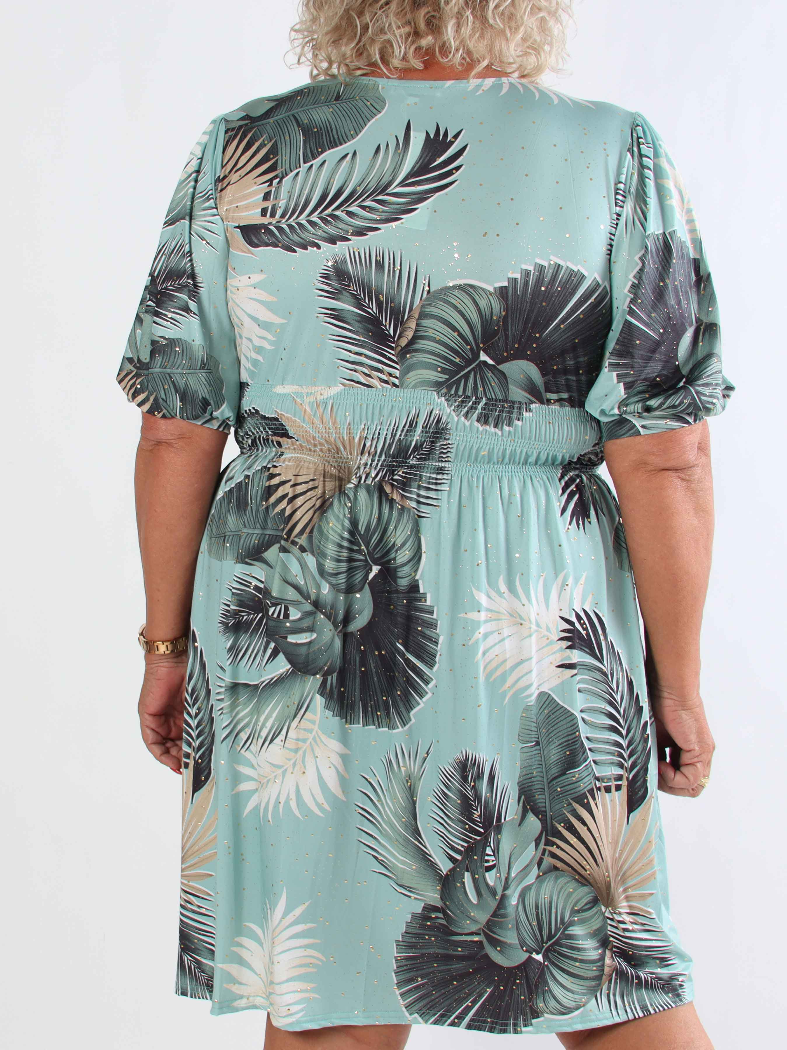 Pamina Palm Short - Elastisk plus size klänning med bladmotiv och gulddamm