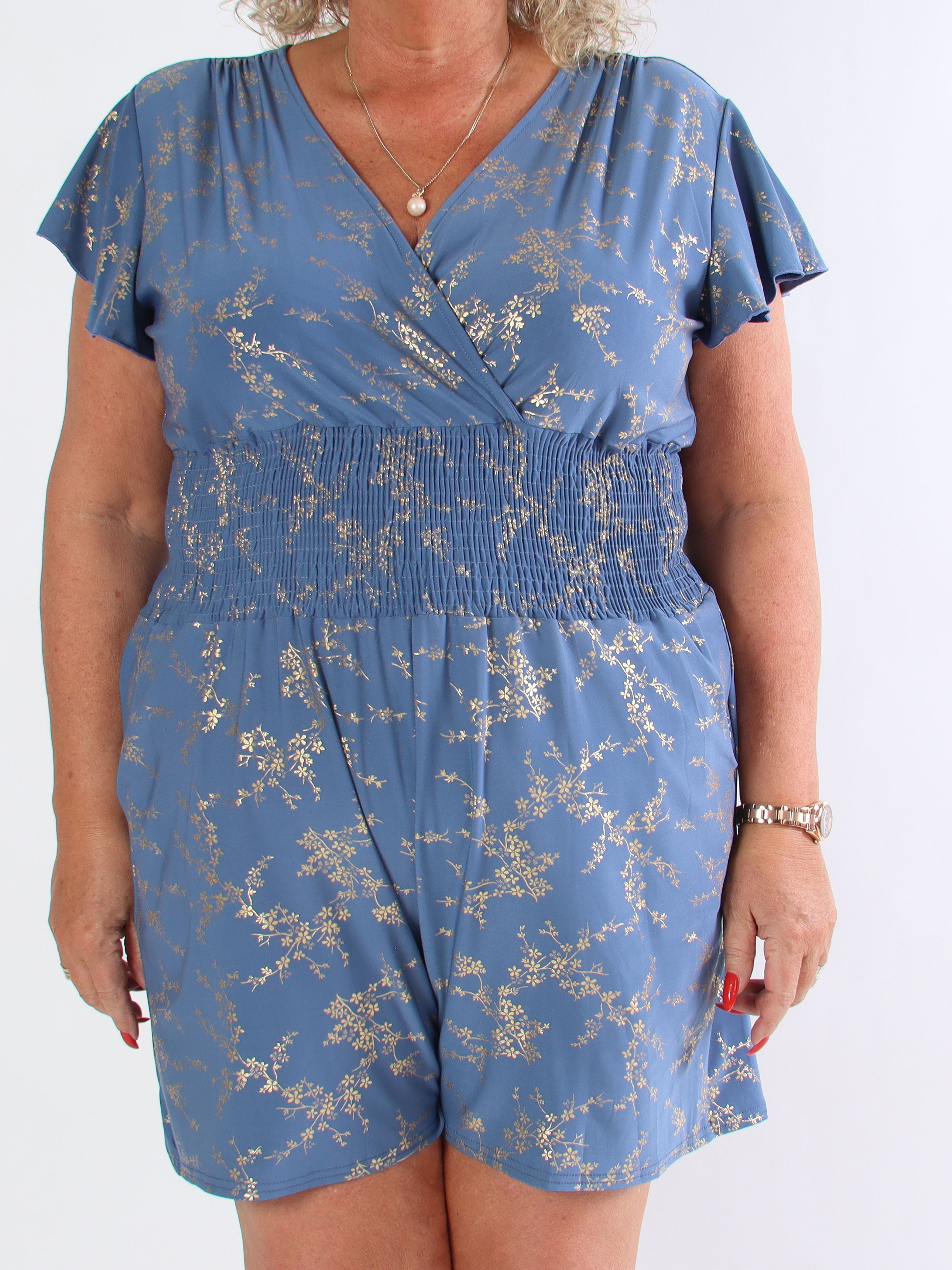 Pams Gold Playsuit - Elastisk jumpsuit i plusstorlek med guldtryck
